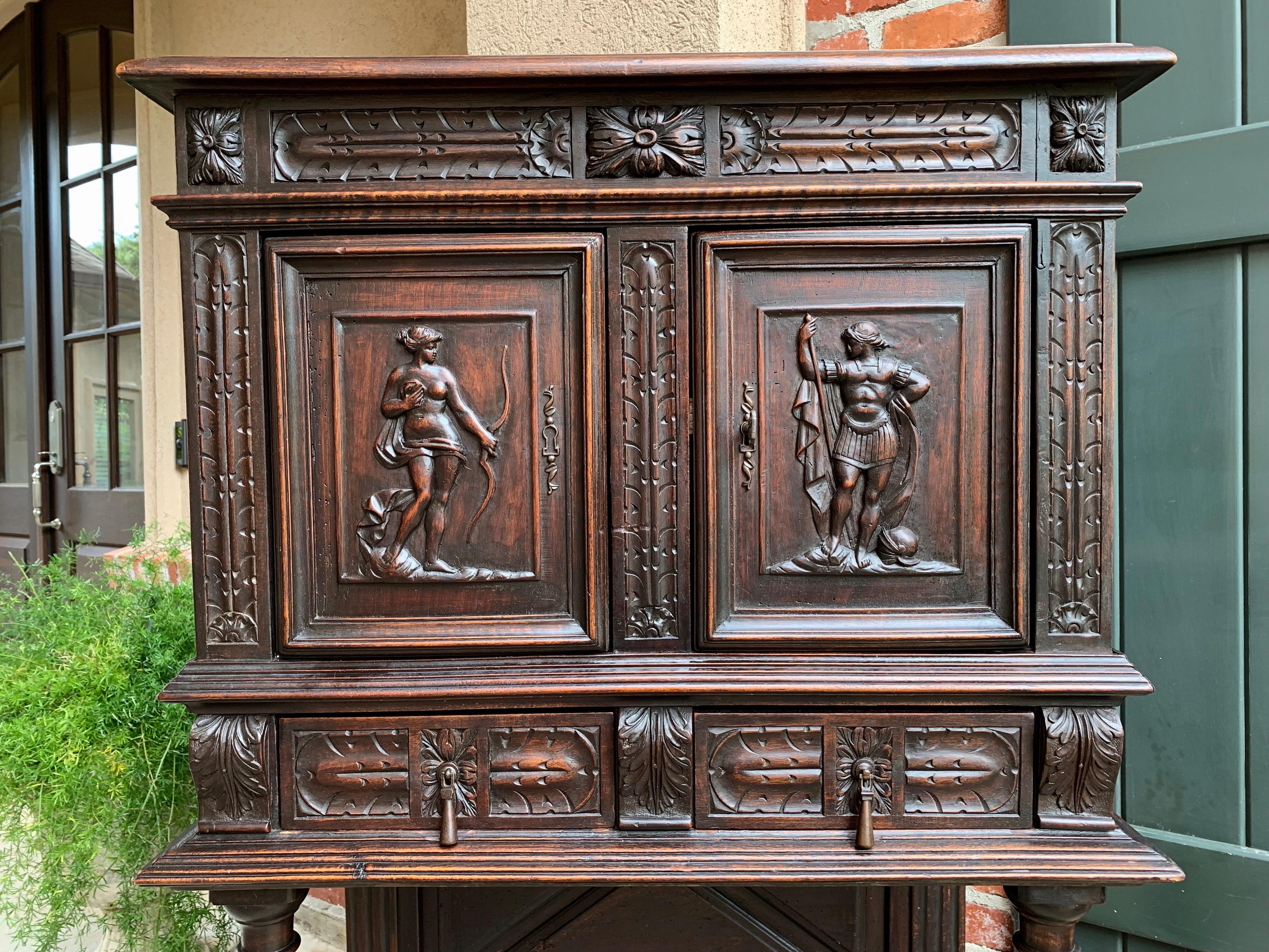 Antique French Carved Oak Cabinet Vestment Bookcase Renaissance Archer Warrior In Good Condition In Shreveport, LA