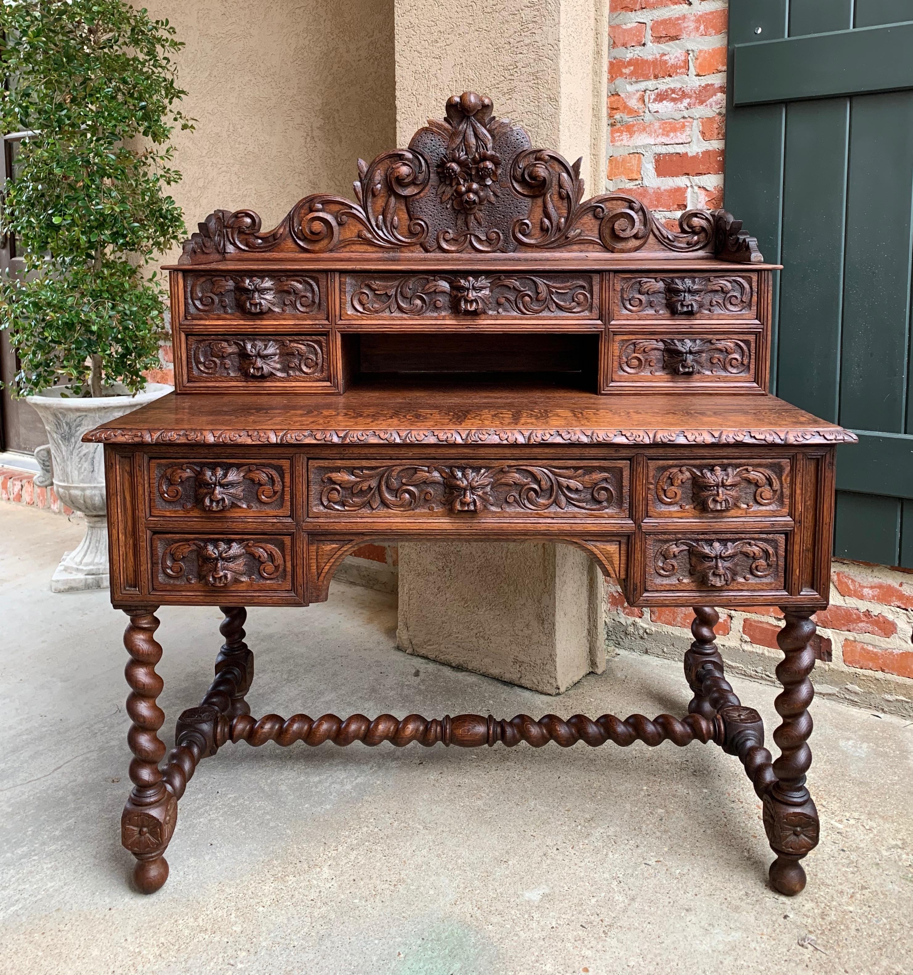Direct from France, one of the most beautifully carved antique French desks we have seen…ever!~
~The tall back crown has a large Black Forest style dimensionally carved plaque with center flowers and foliage, flanked by scrolls and flourishes with