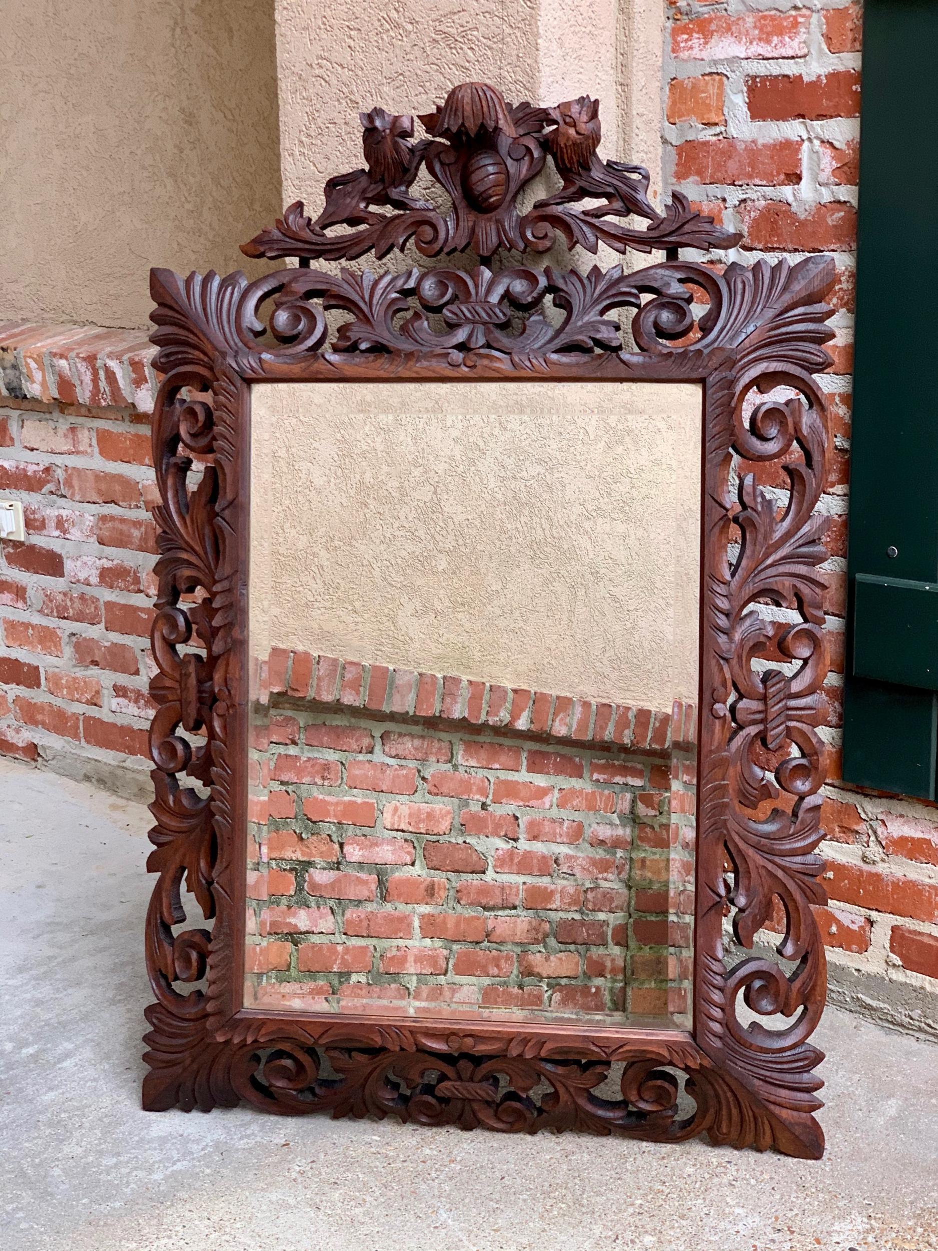 Antique French carved oak frame beveled mirror wall pier mantel renaissance style.

~Direct from France~
~Large and lovely antique carved French wall or mantel mirror~
~Wide frame, open carved on all sides, classic style that blends with any