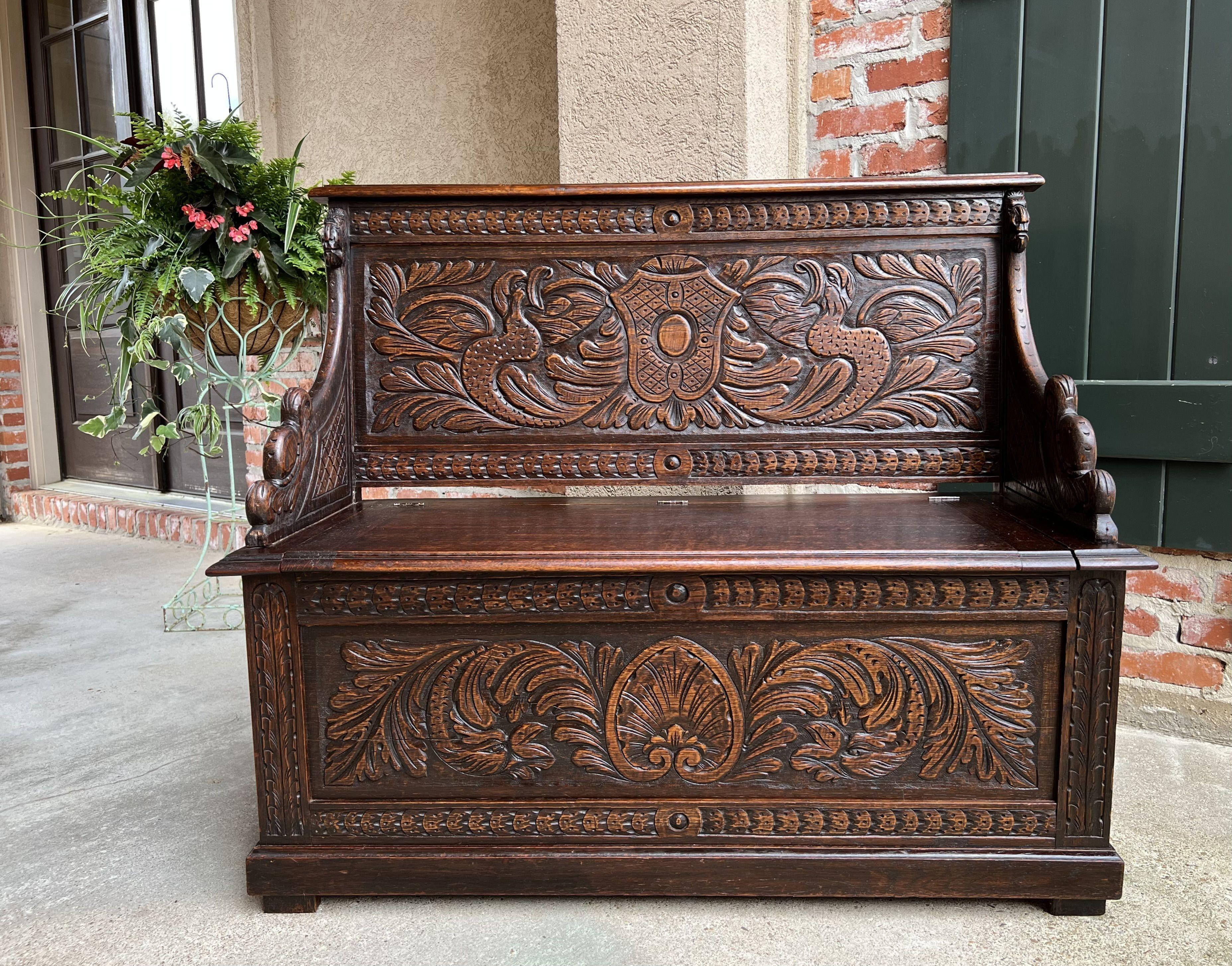 Antique French carved oak hall bench renaissance gothic chapel.

Direct from Europe, a lovely antique carved bench, with a great combination of style and size. Fully carved back, front and sides, in the same manner as the larger, high back antique