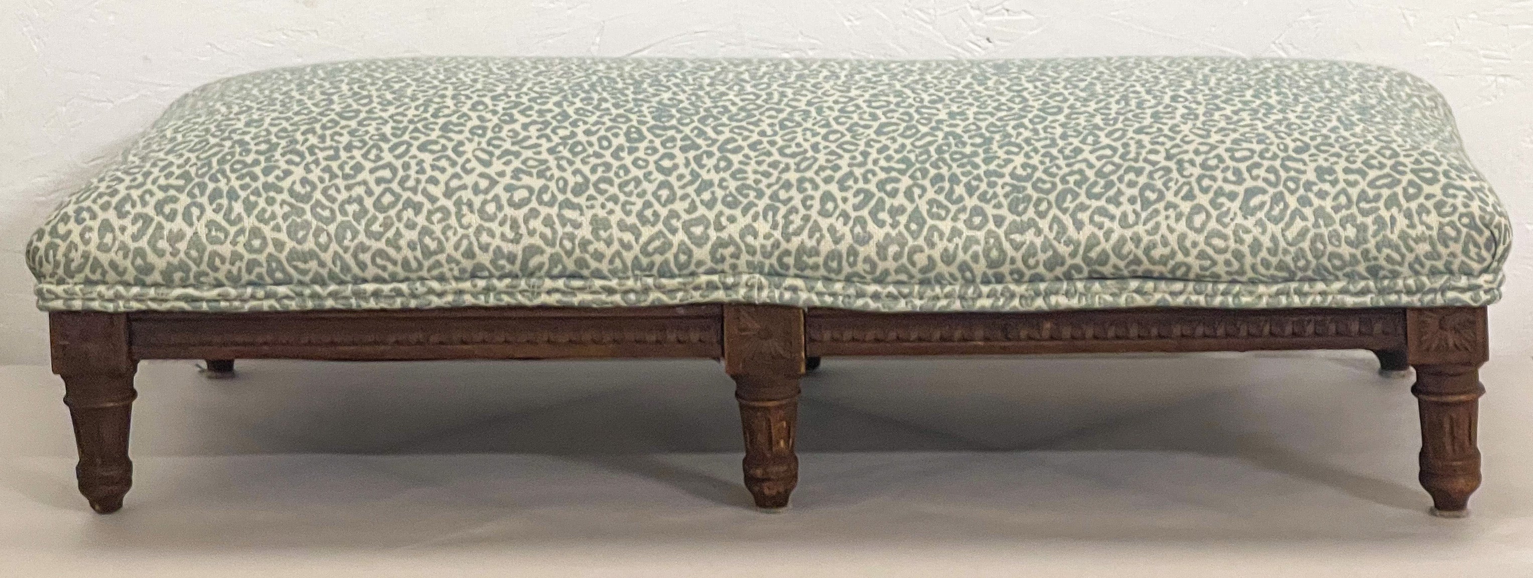 ‘Tis the season! This is an antique French ottoman in a mini celadon leopard. The frame is carved oak and is in very good condition.
