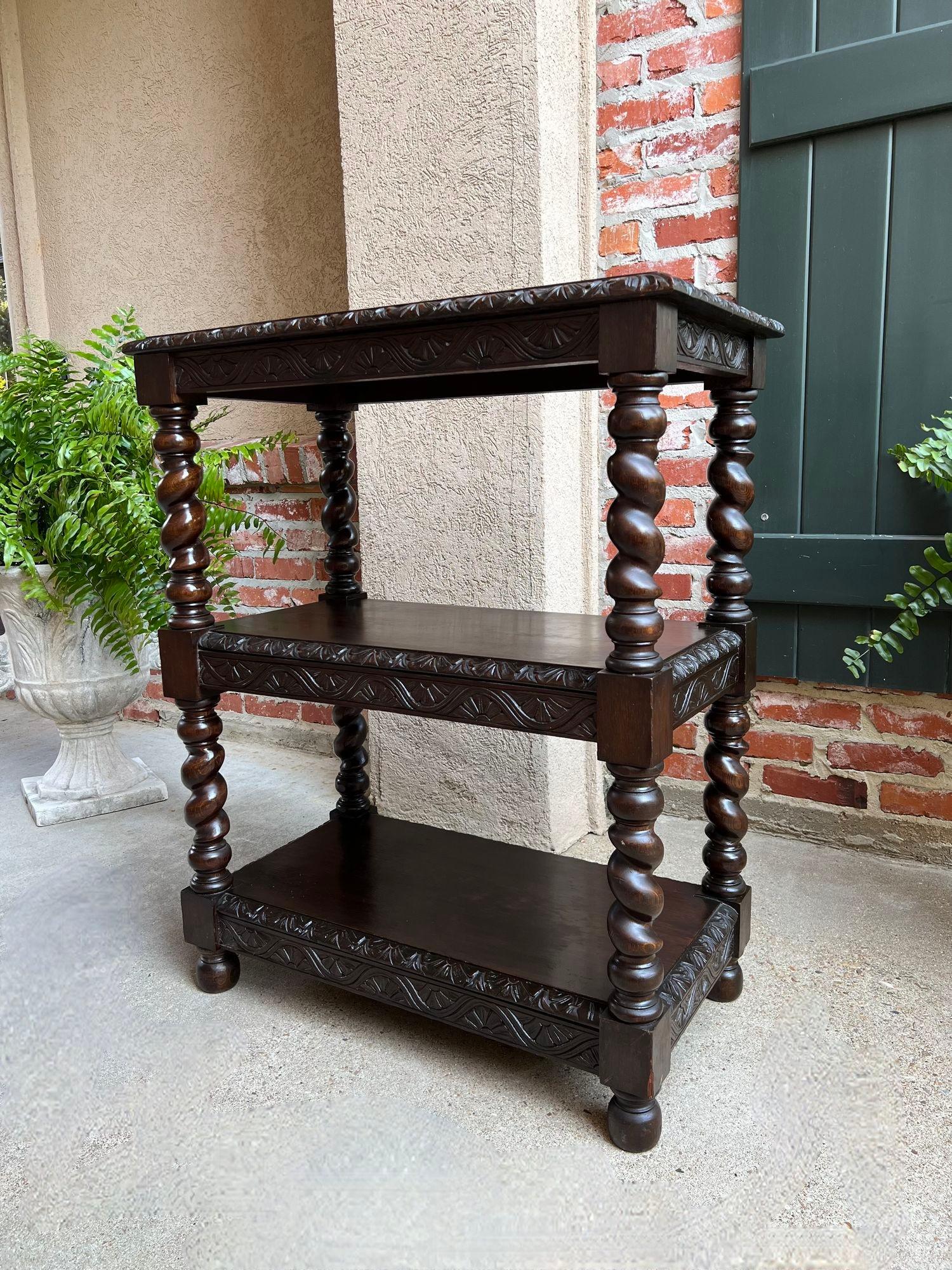 Antique French Carved Oak Server Sideboard Barley Twist Bookcase Display Shelf.

Direct from France, a beautiful 19th century French dessert server/sideboard in an excellent size, loaded with carvings and versatile for use and placement throughout