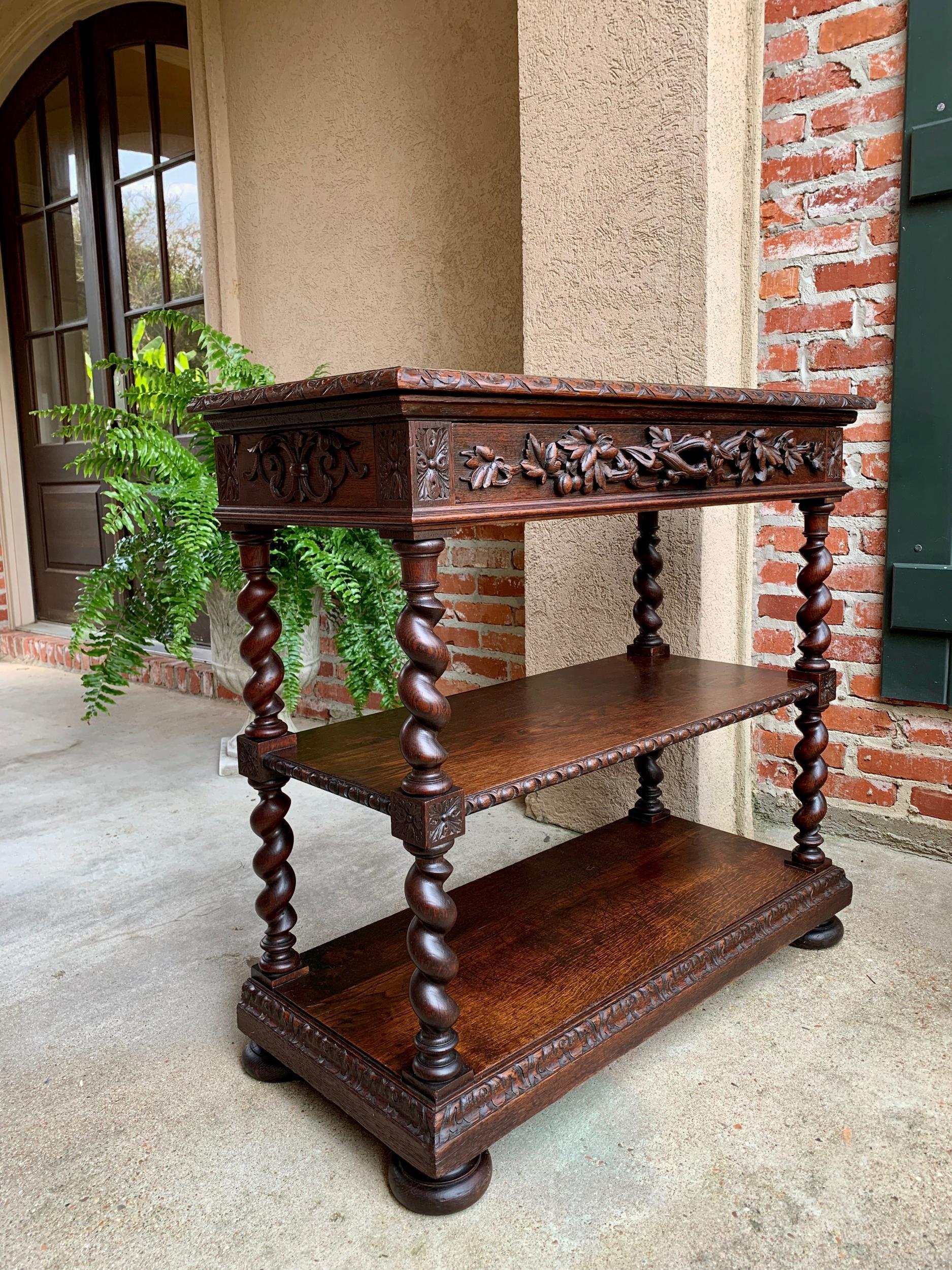 Antique French carved oak sideboard server barley twist dessert table Louis XIII

~Direct from France~
~Lovely antique French sideboard/display bookcase/shelf/server, in a very versatile size!~
~Full length front drawer with carved branch Black