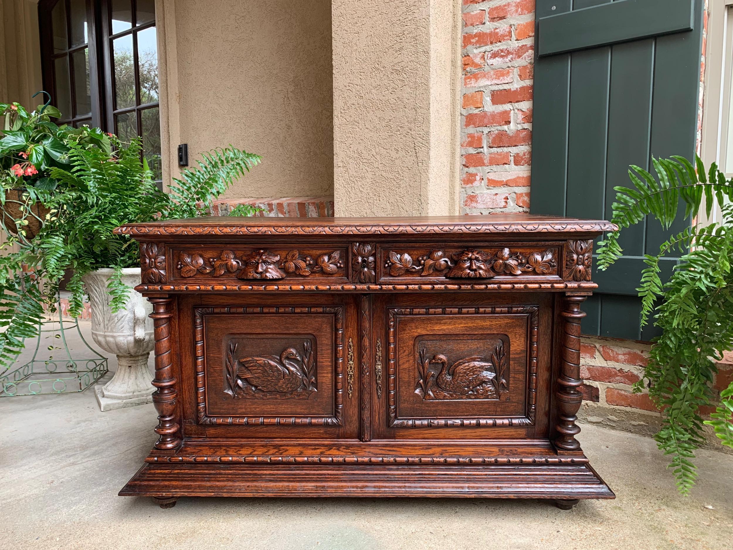Antique french carved oak sideboard server cabinet sofa table Swan Henri II

~Direct from France~
~Lovely antique French carved cabinet/server, 4 ft. in length, versatile for use as a sideboard/server, kitchen cabinet or sofa/foyer table with