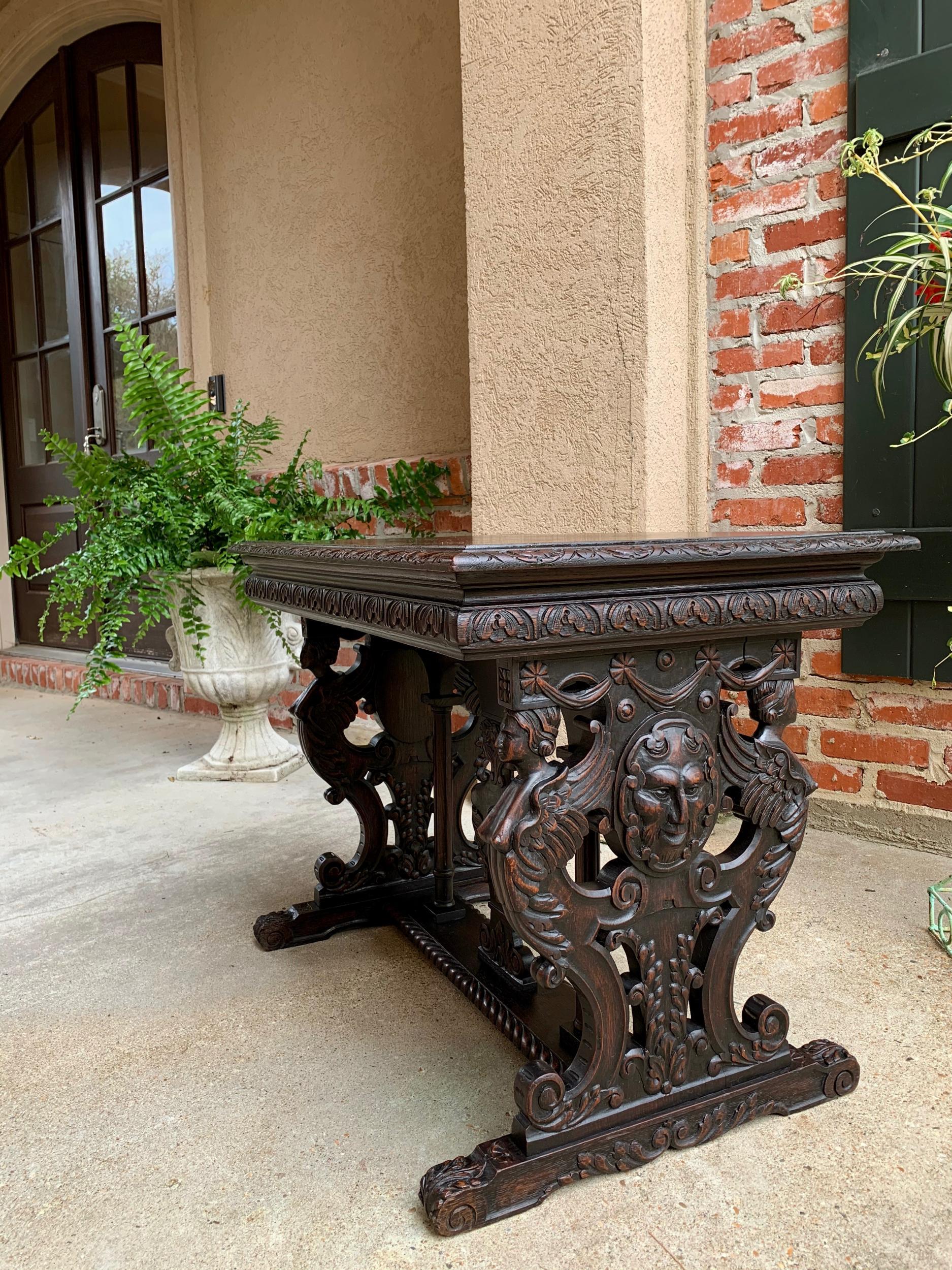 Antique French Carved Oak Sofa Side Accent Table Renaissance Cherub Trestle In Good Condition In Shreveport, LA