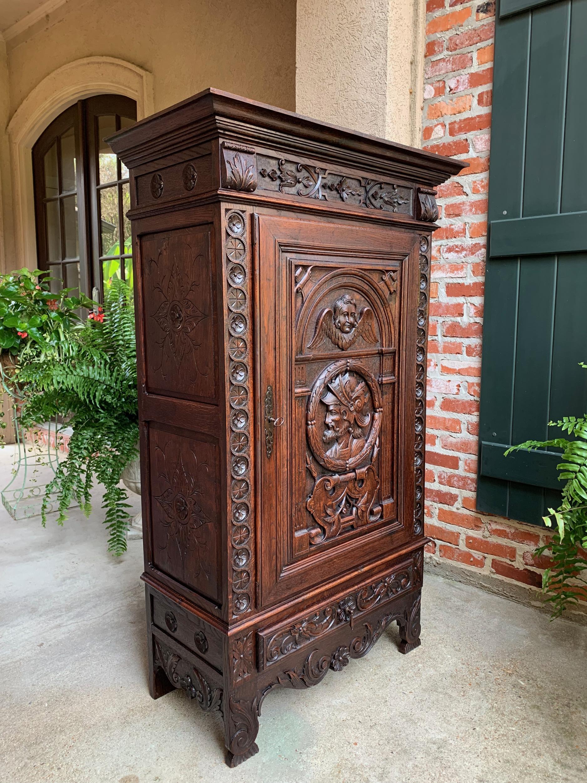 Hand-Carved 19th century French Carved Oak Storage Cabinet Renaissance Roman Centurion  For Sale