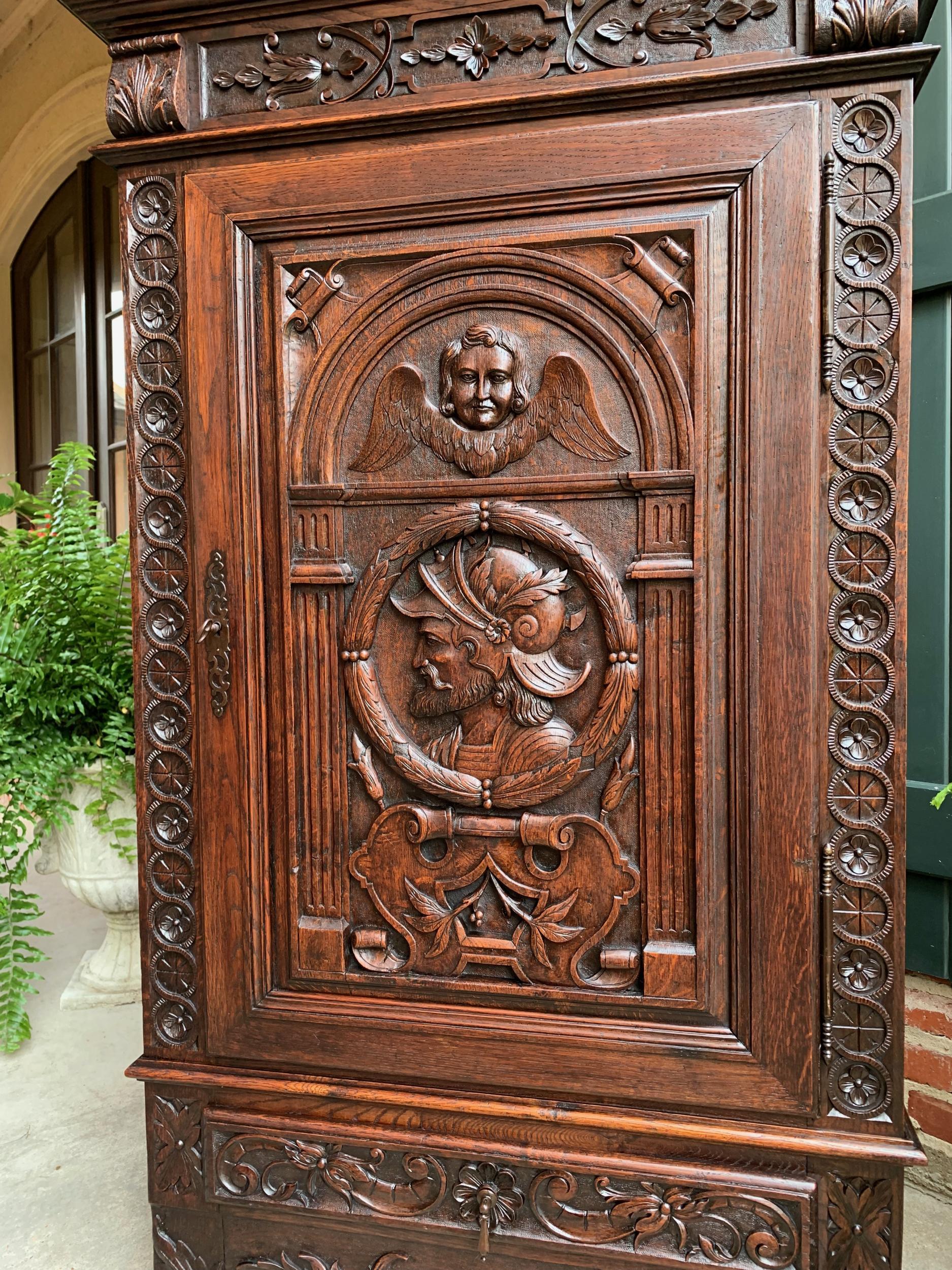 19th Century 19th century French Carved Oak Storage Cabinet Renaissance Roman Centurion  For Sale