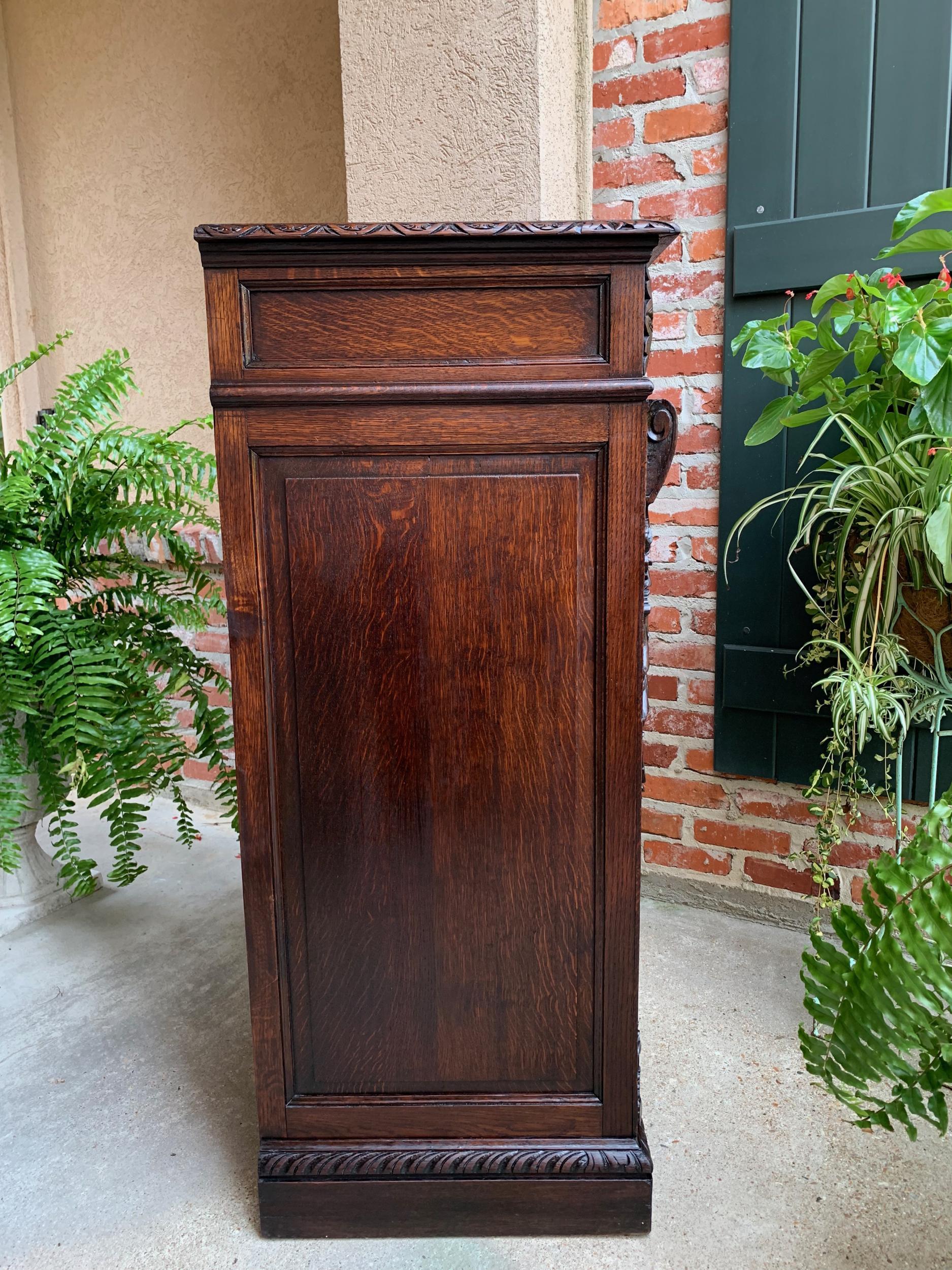 19th century French  Tall Cabinet Faux Chest of Drawers Louis XIV Carved Oak For Sale 11