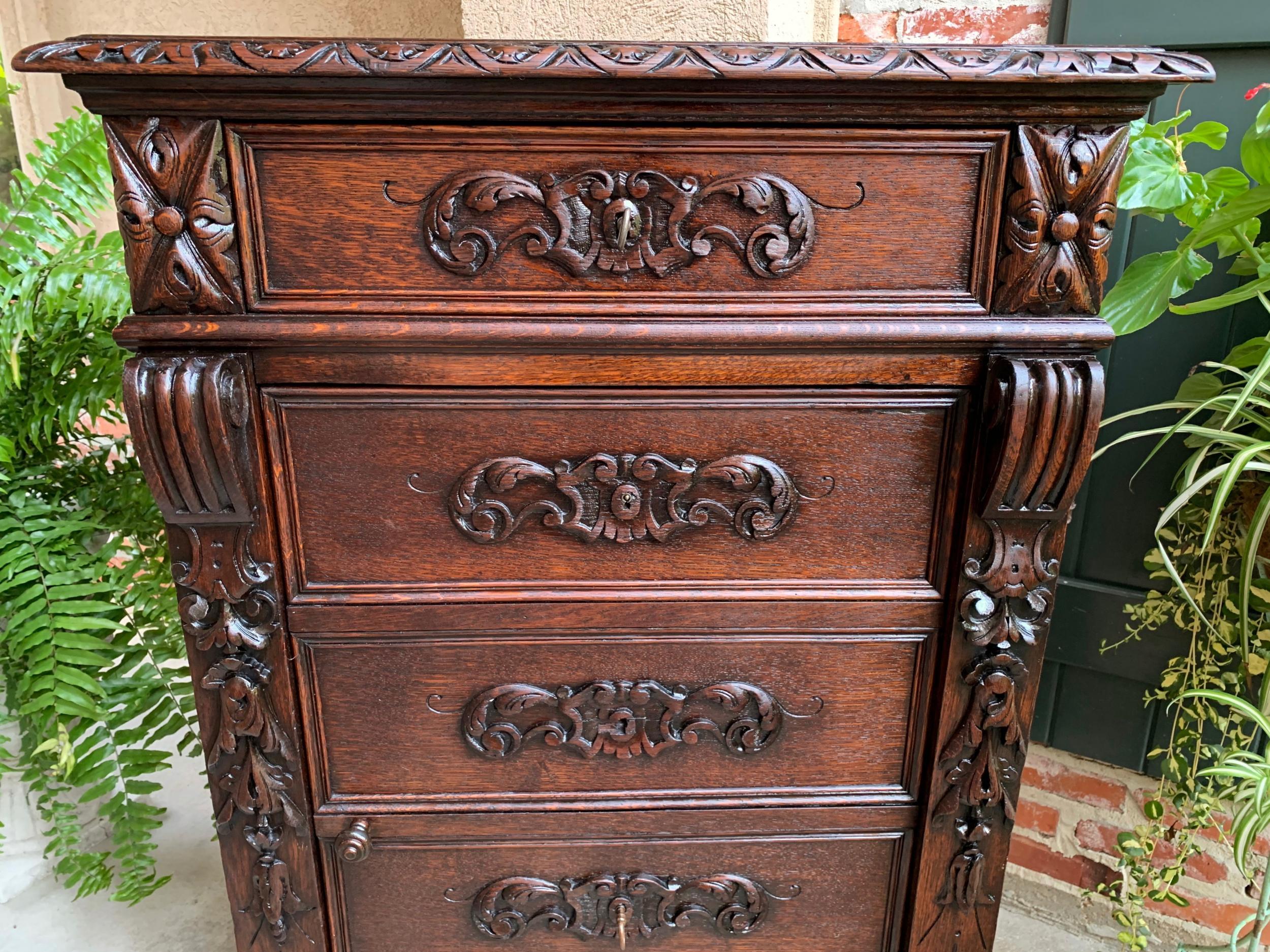 Hand-Carved 19th century French  Tall Cabinet Faux Chest of Drawers Louis XIV Carved Oak For Sale