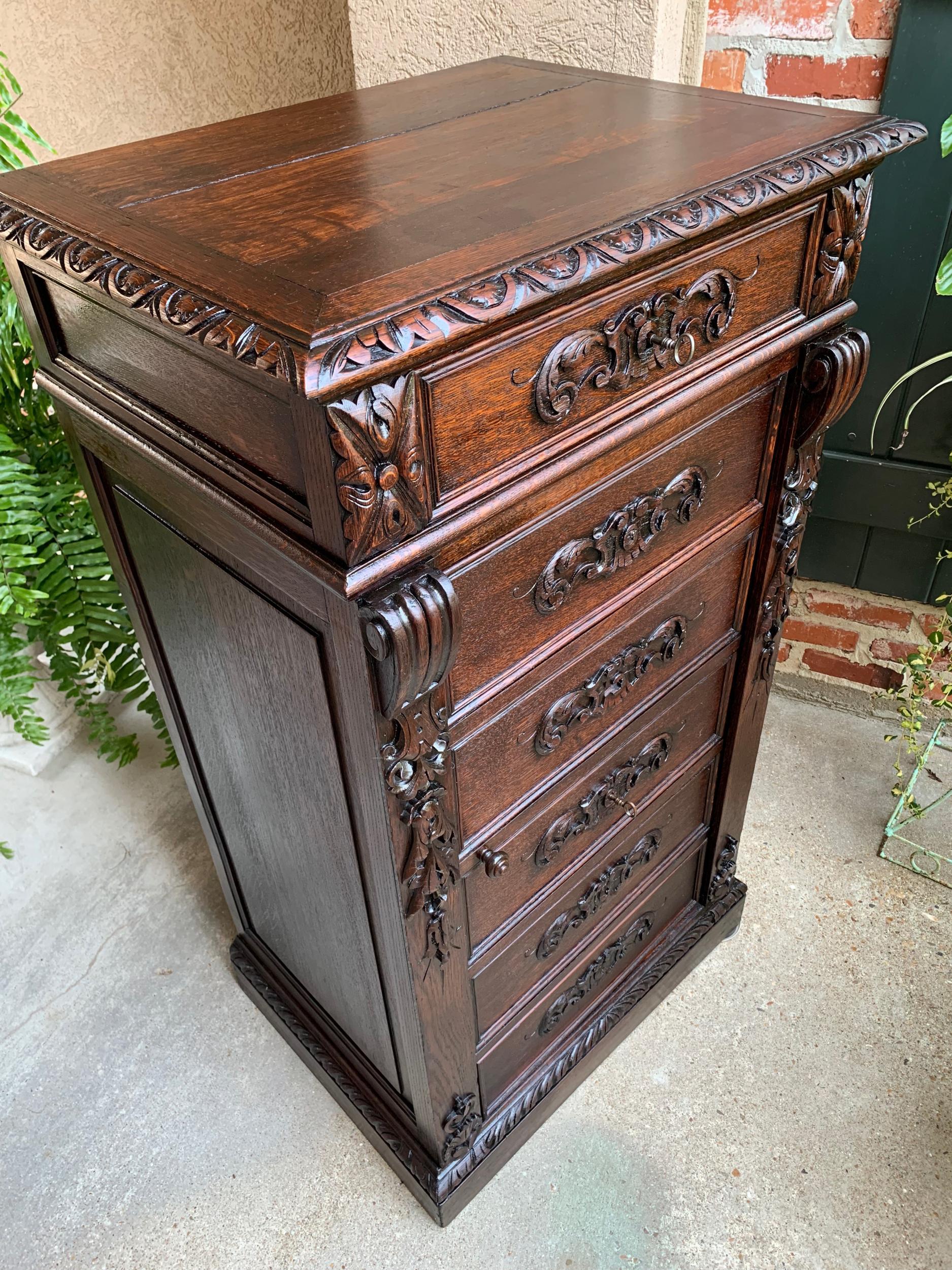 19th century French  Tall Cabinet Faux Chest of Drawers Louis XIV Carved Oak For Sale 1