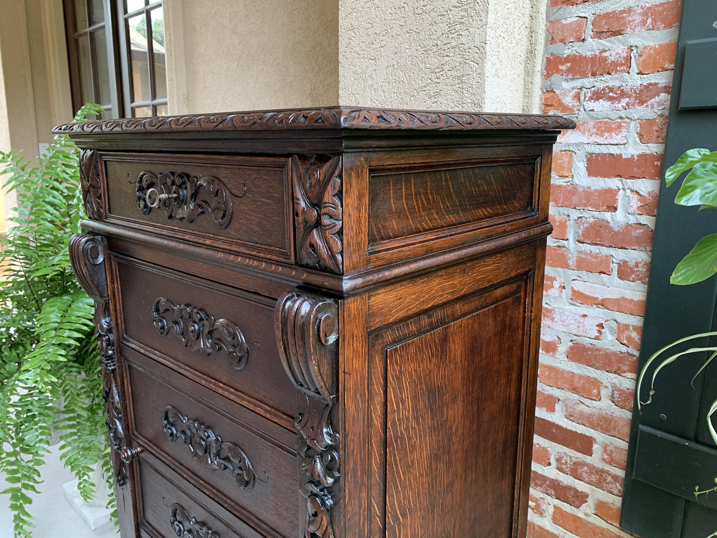19th century French  Tall Cabinet Faux Chest of Drawers Louis XIV Carved Oak For Sale 2