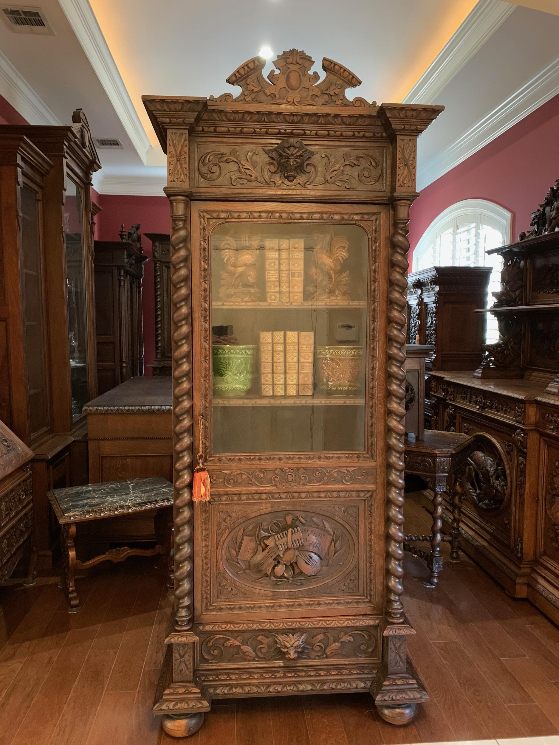Antique French carved oak vitrine cabinet bookcase barley twist renaissance

~Direct from France~
~A gorgeous antique French bookcase cabinet, unusually SLENDER profile, yet very tall and majestic (almost 8. ft.) and covered with beautiful hand