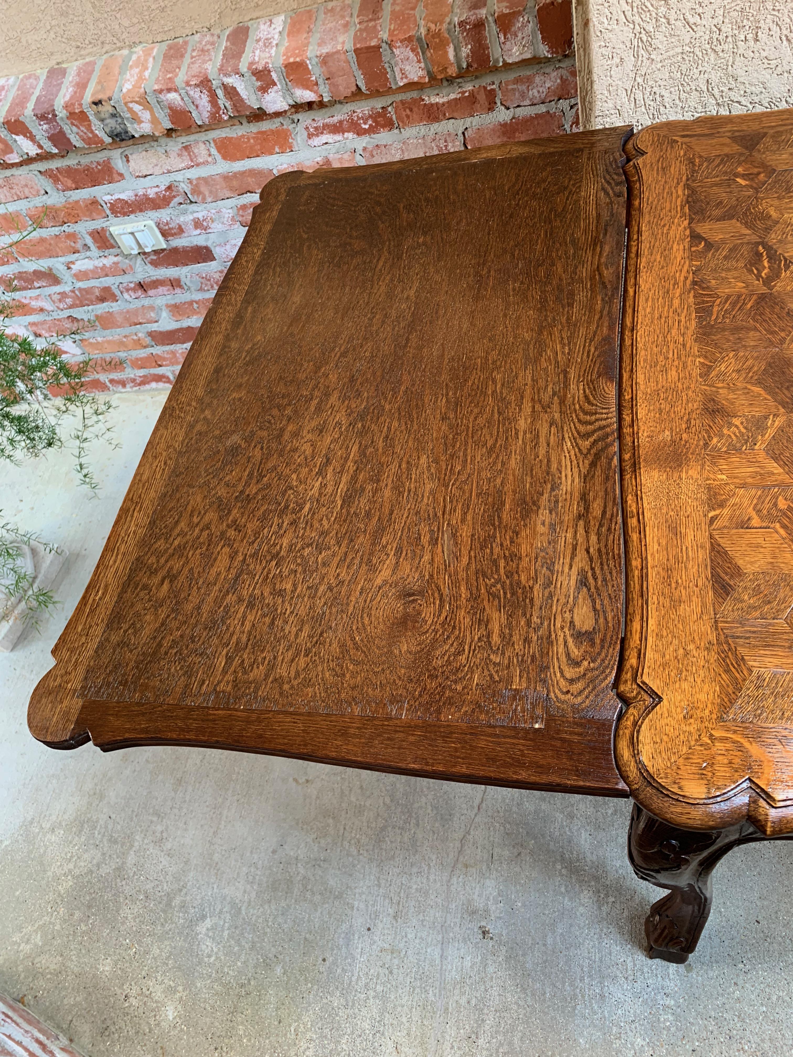 Antique French Carved Tiger Oak Parquet Dining Table Draw Leaf Ram Hoof In Good Condition In Shreveport, LA