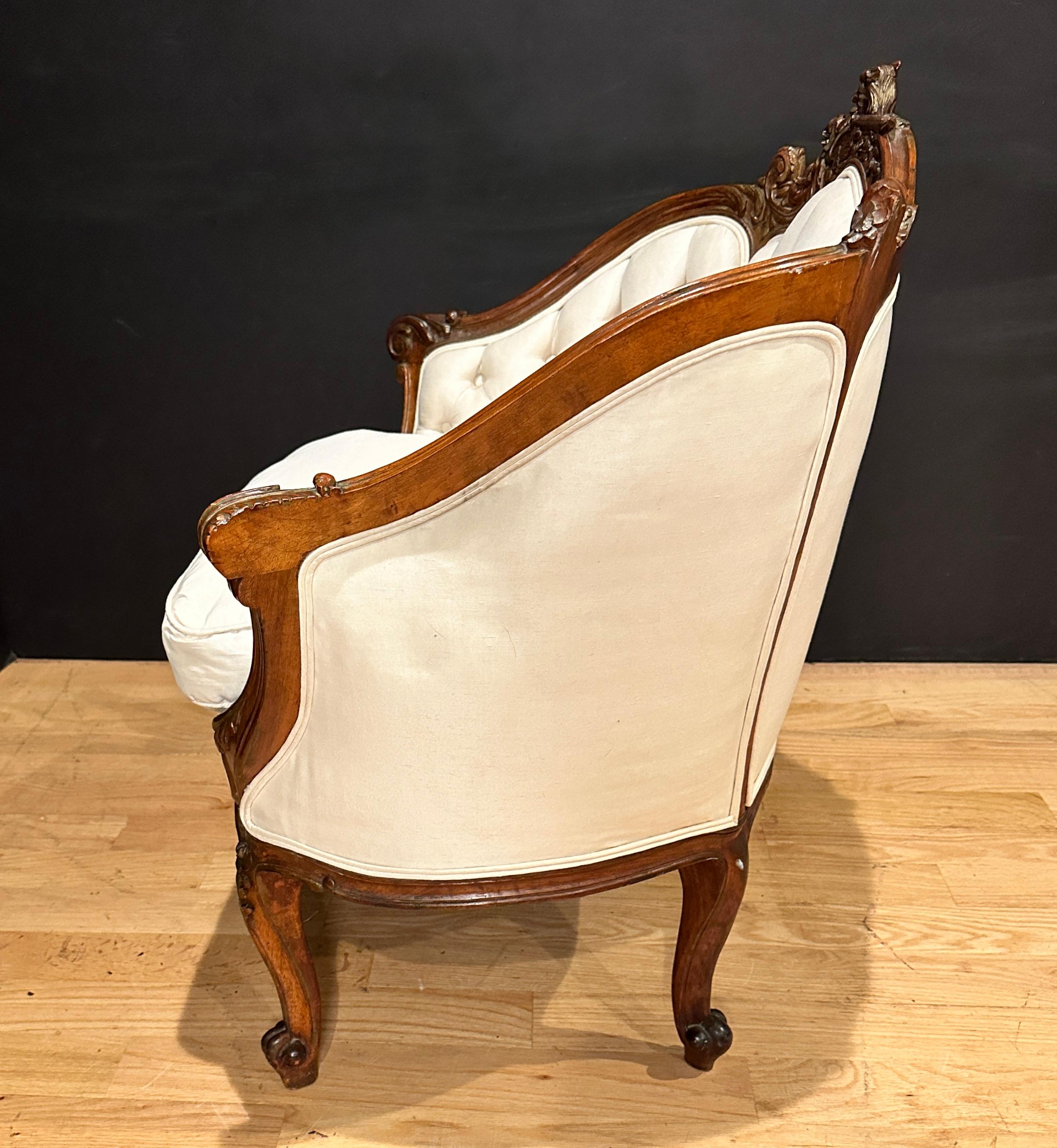 19th Century Antique French Carved Walnut And Parcel Gilt Armchair For Sale