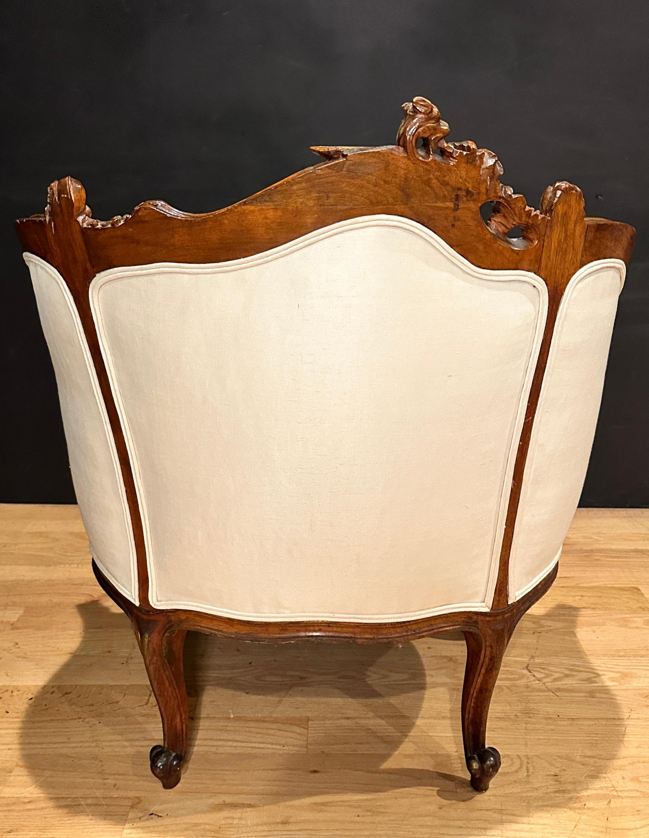 Upholstery Antique French Carved Walnut And Parcel Gilt Armchair For Sale