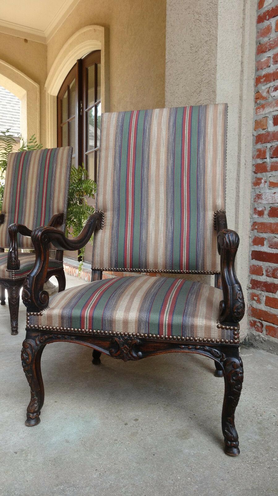~Direct from France~
~Absolutely stunning antique French armchair~
~Tall and majestic~
~Hand-sculpted from fine French walnut in the manner of Louis XV, this elegant chair features beautiful jewel tone striped textile upholstery~
~Serpentine