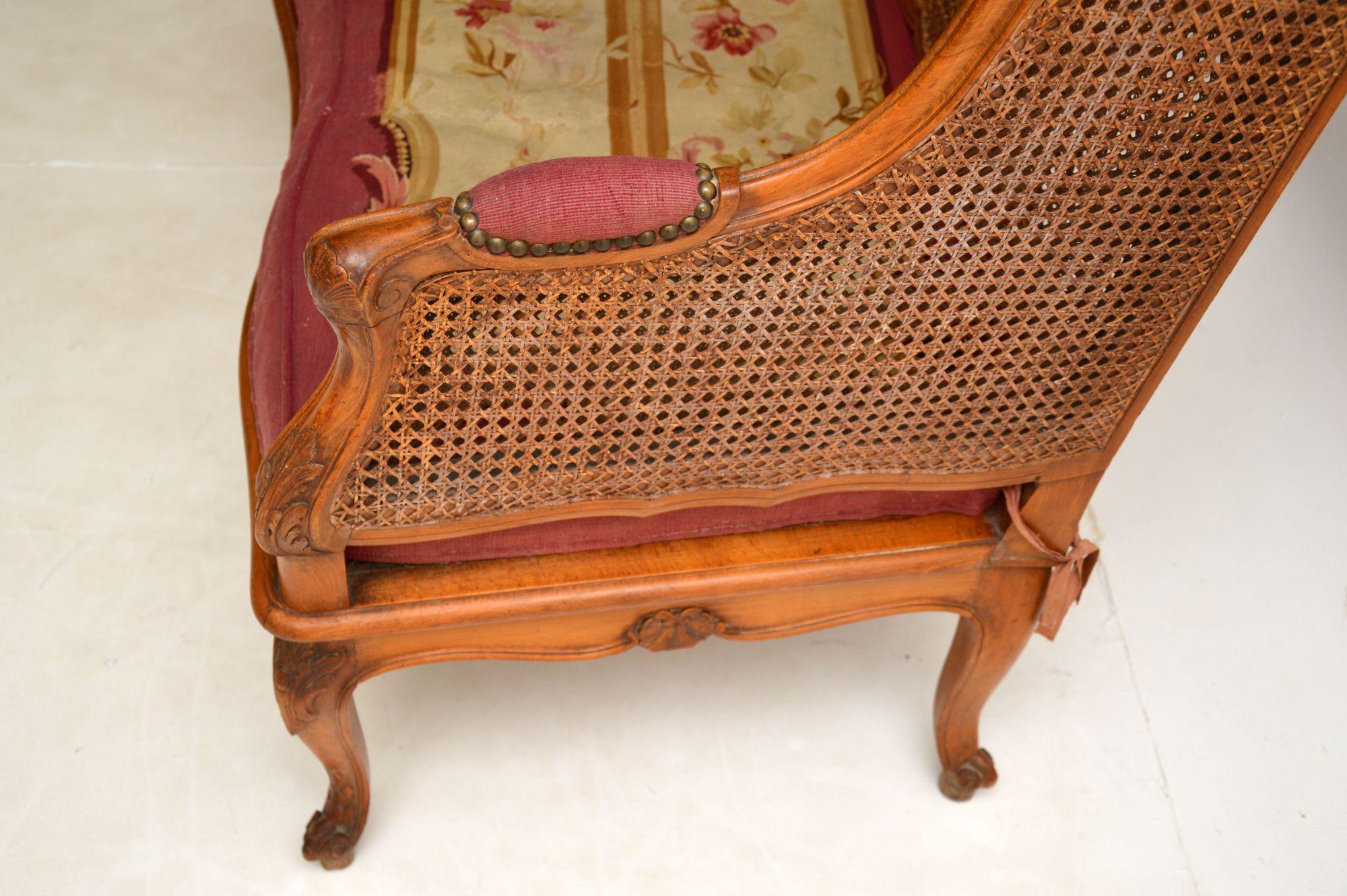 Antique French Carved Walnut Bergere Sofa For Sale 5