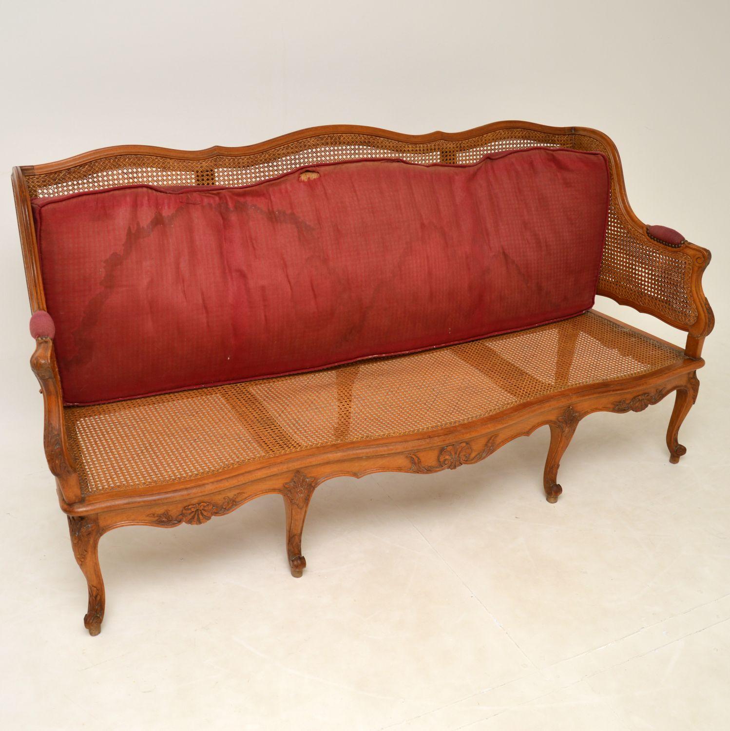 Late 19th Century Antique French Carved Walnut Bergere Sofa For Sale