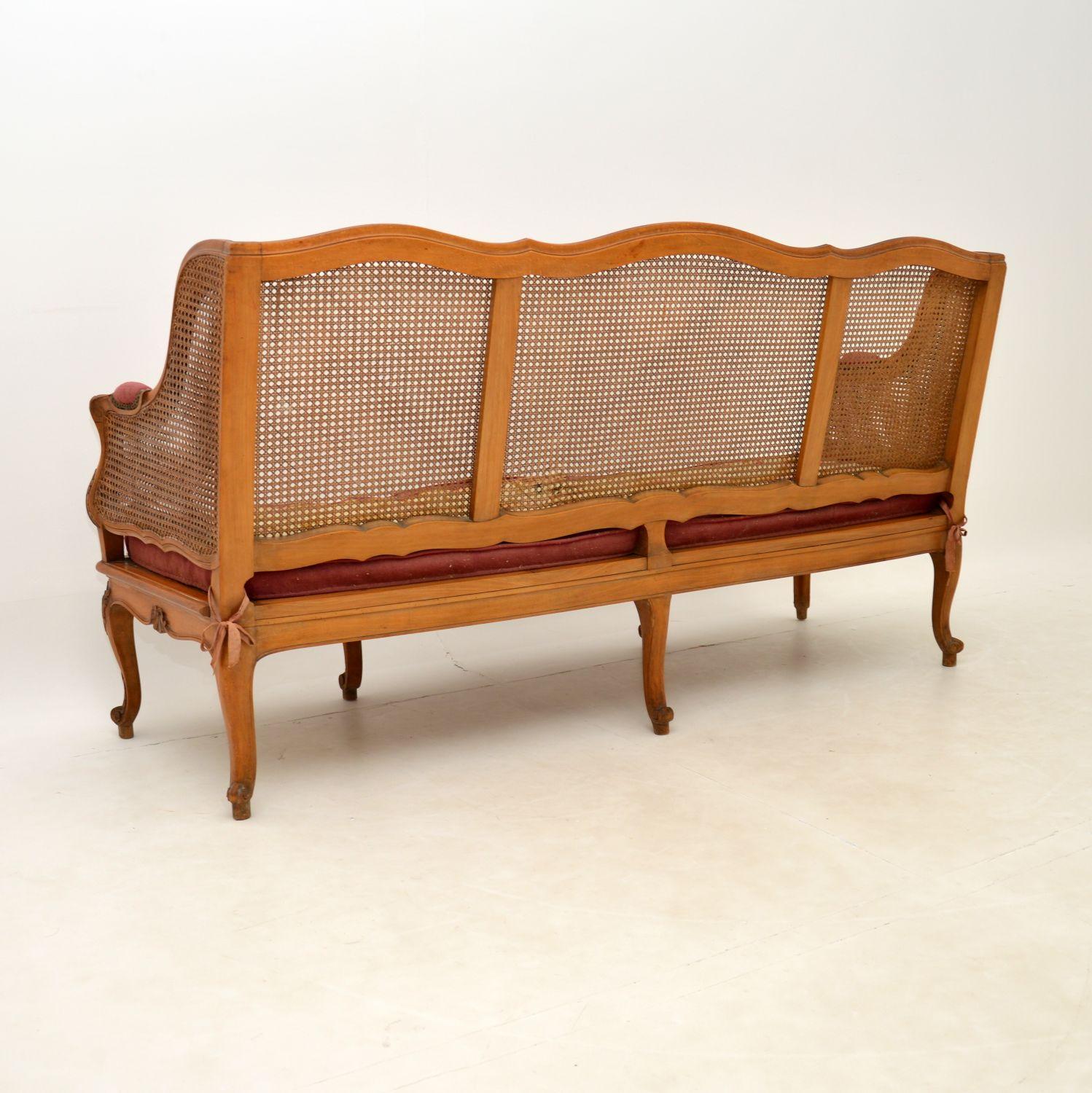Antique French Carved Walnut Bergere Sofa In Good Condition For Sale In London, GB