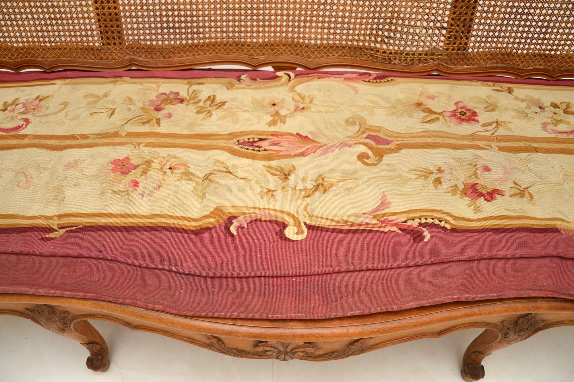 Antique French Carved Walnut Bergere Sofa For Sale 9