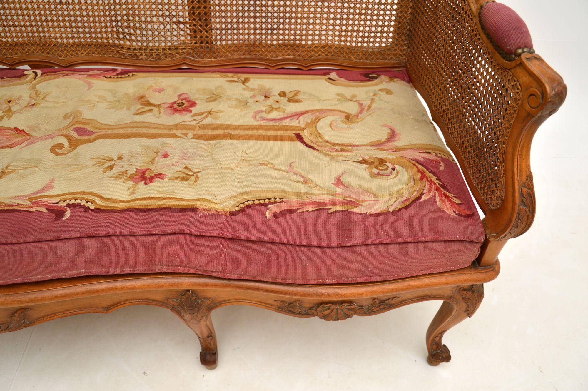 Antique French Carved Walnut Bergere Sofa For Sale 10