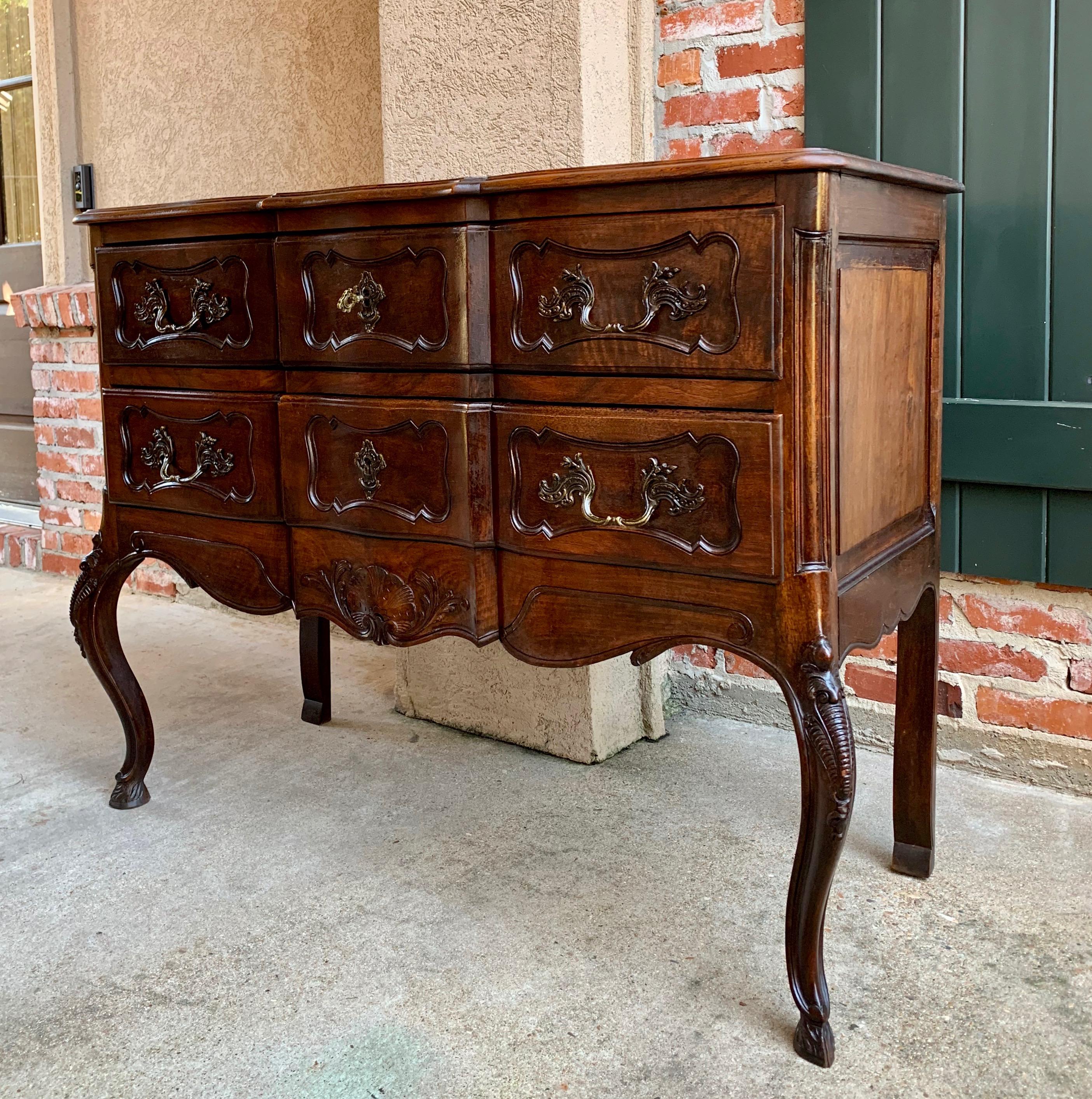 Direct from France, a substantial antique French carved walnut ‘commode’, or ‘chest of drawers’, this versatile piece is even suitable for a sideboard, with it’s great combination of size, style and construction!

~Two large drawers feature