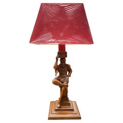 Antique French Carved Walnut Court Jester Table Lamp with red shade