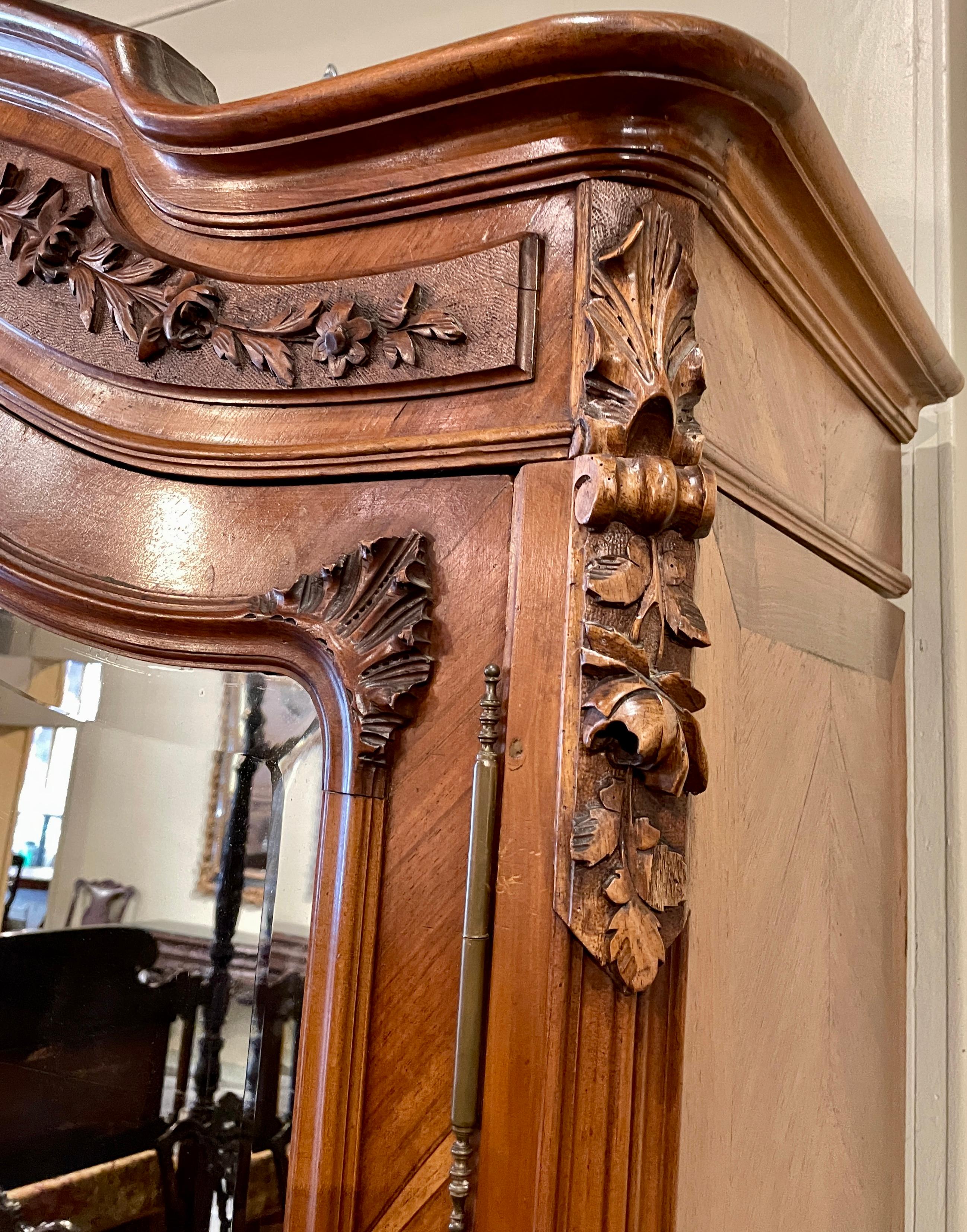 19th Century Antique French Carved Walnut Double Door Armoire with Beveled Mirrors circa 1890