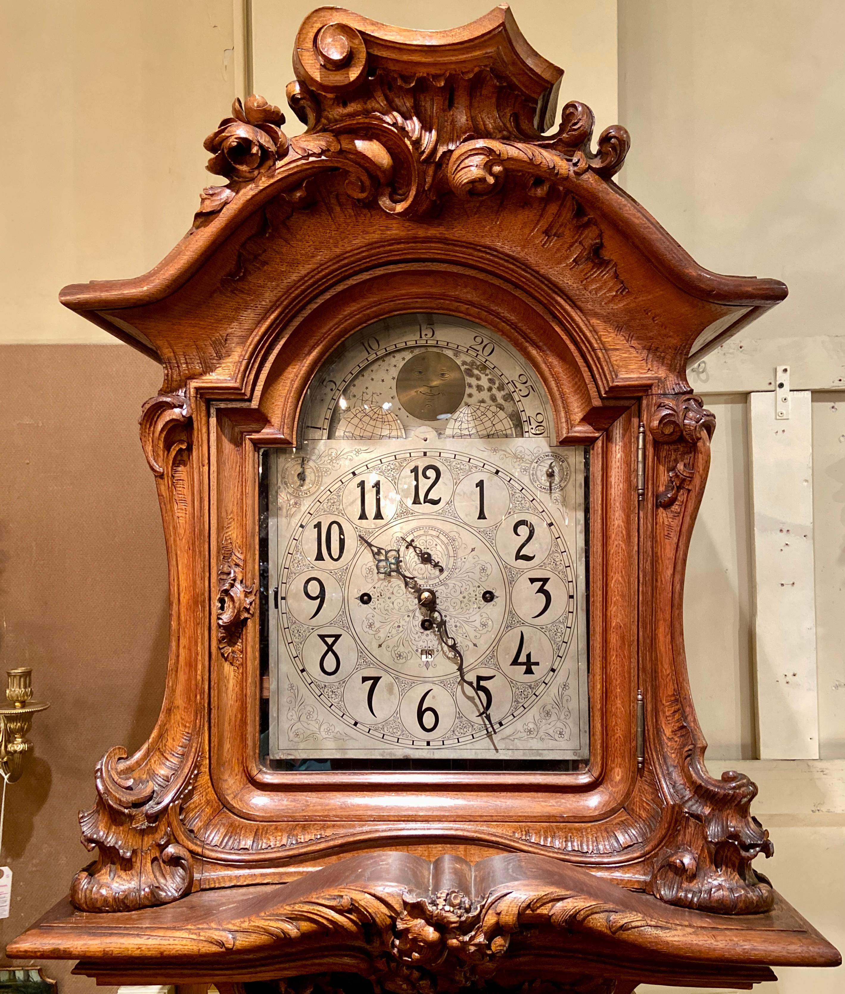 Spectacular Antique French Carved walnut master workmanship musical clock with the Cambridge Chimes (Westminster Chimes). Grand Size with intricate carving.