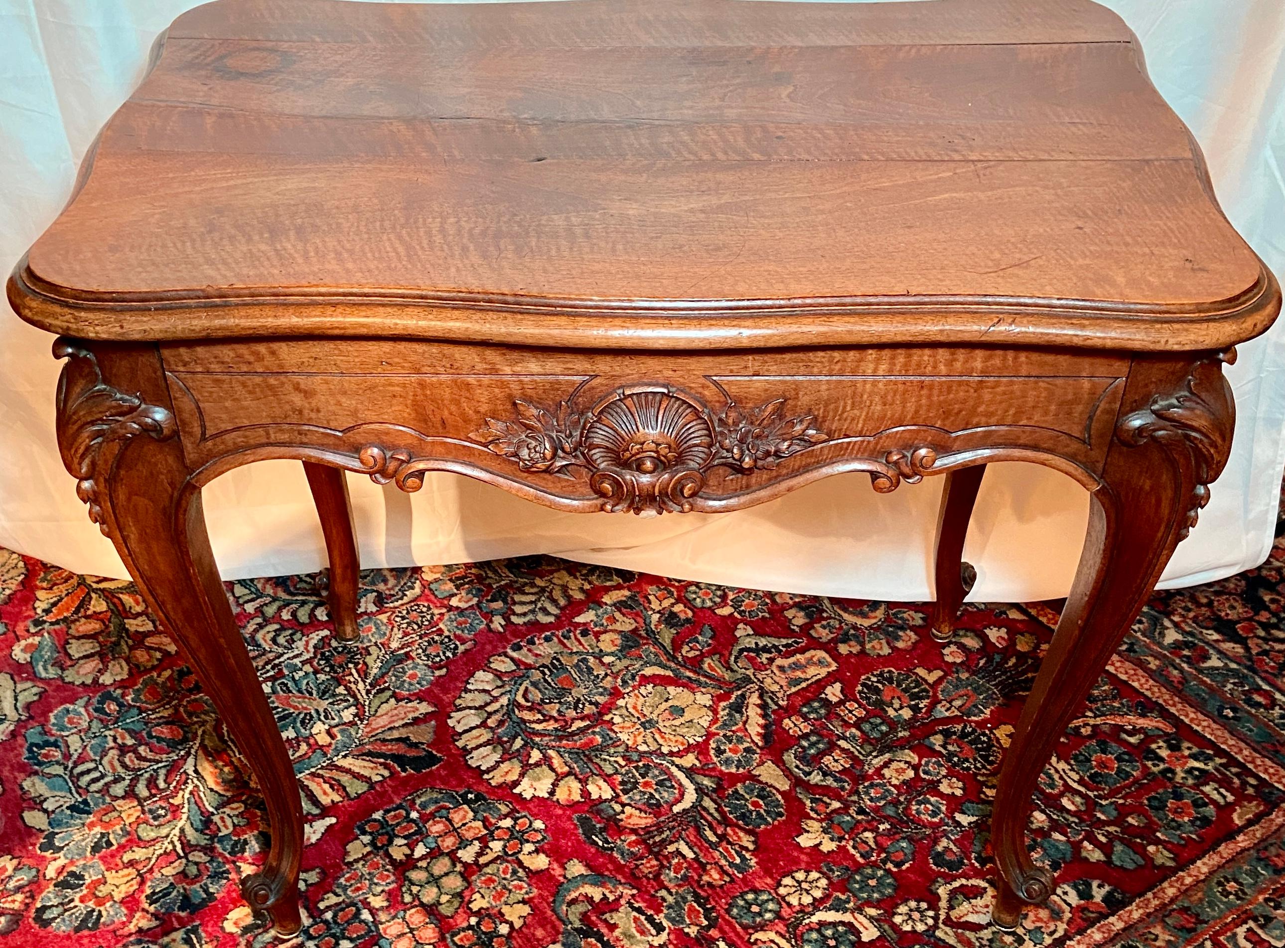 Antique French carved walnut occasional table, circa 1860.