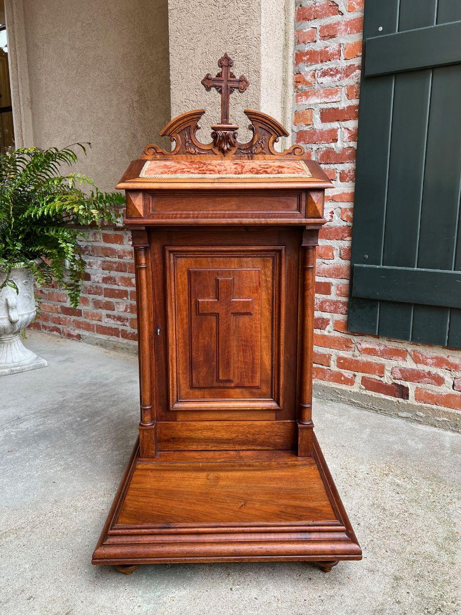 Antique French carved walnut prayer kneeler Prie Dieu chapel gothic cabinet

Direct from France, this stunning 19th century carved walnut “Prie Dieu” or kneeler. Elegant profile, with ornately carved cross center in the large carved