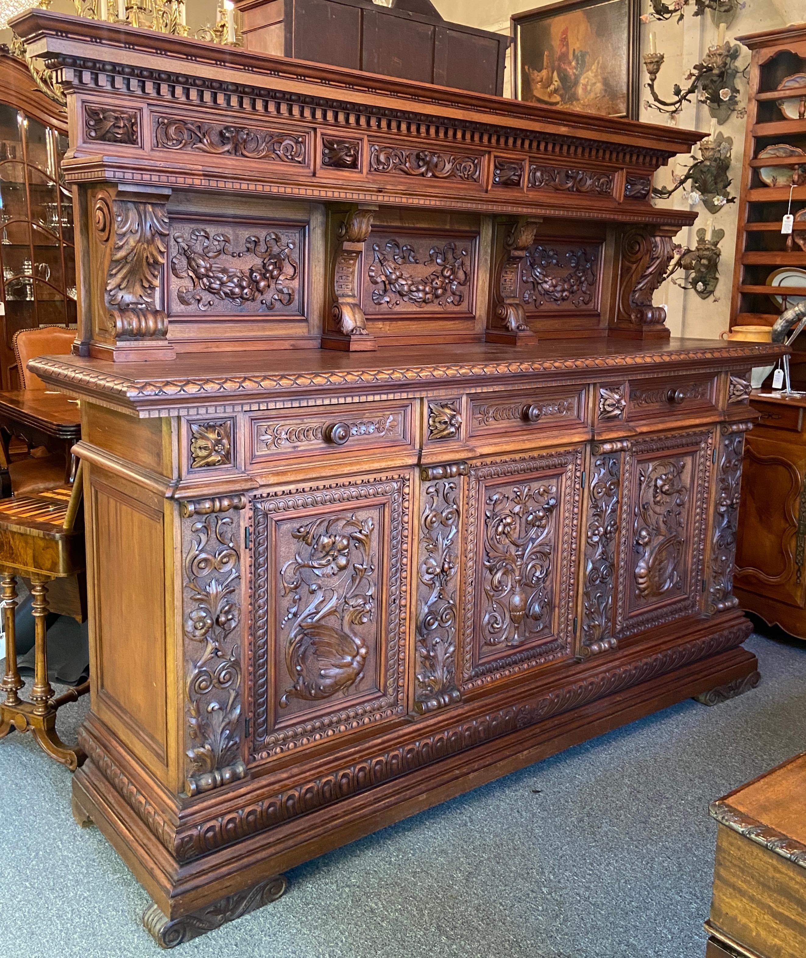 Grand-Size Antique French Intricately Carved Walnut Sideboard with Florals, Griffins and Urn Motifs, Circa 1870-1880.