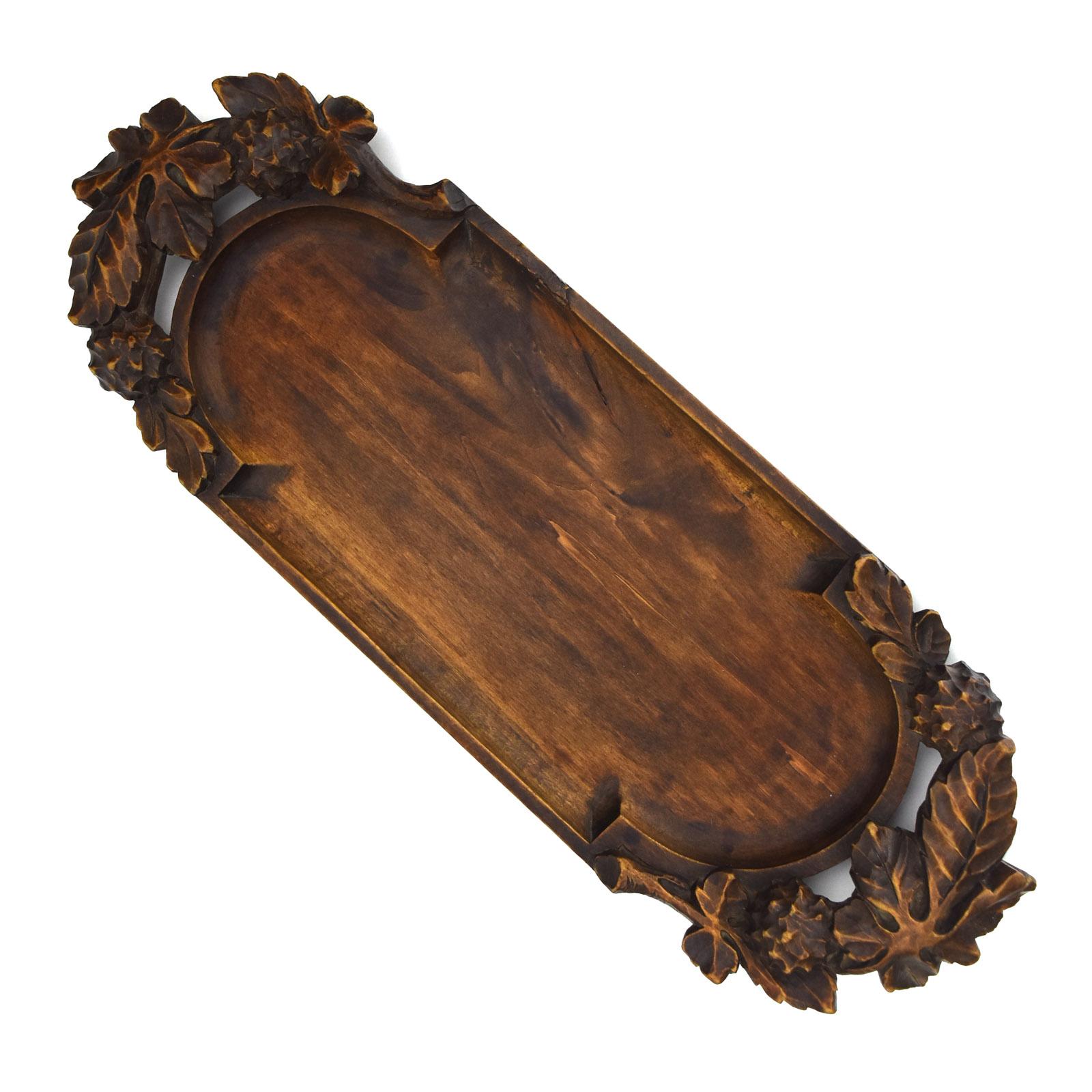 This exquisite antique French tray, by Etienne Morlet, showcases the craftsmanship of the Art Nouveau period and the influence of the Ecole de Nancy. 
Finely hand-carved from wood, the tray is adorned with a dynamic and detailed relief of chestnut