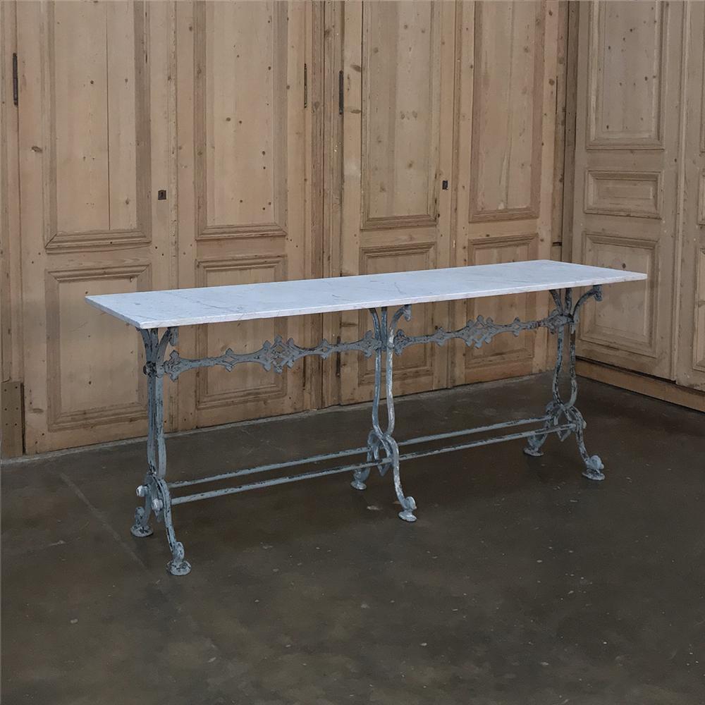 Antique French cast iron and marble cafe - sofa table makes for the perfect piece to put behind a grand sofa, or in a hallway or perhaps a spacious stairway landing. Open, airy look is complemented by the honed Carrara marble top.
Circa