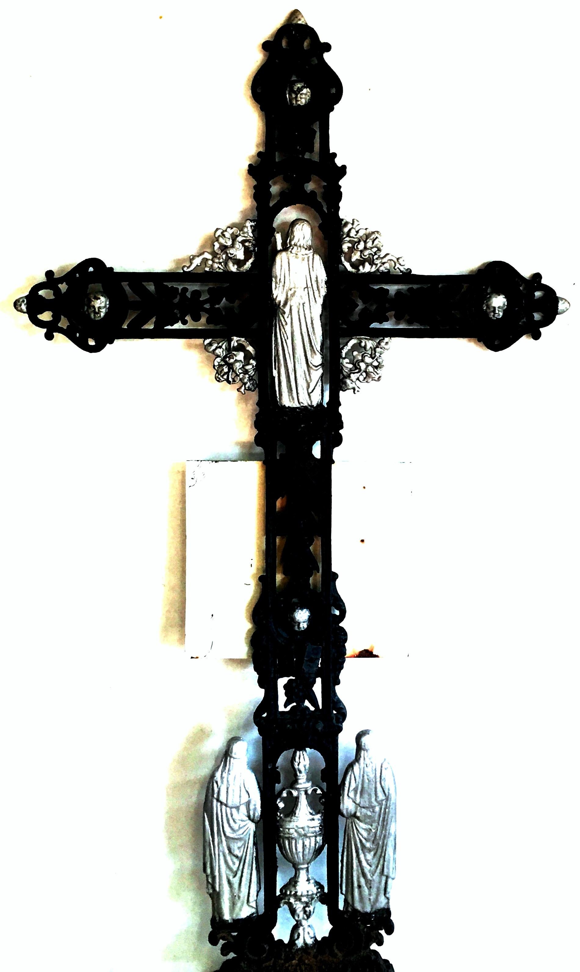 Antique French painted cast iron black and silver Louis XVI style grave marker-crucifix. Features amazing high relief detail on both sides and is accented with silver leaf detail. Depicting Jesus as a Shepard Louis XVI design elements. Mask faces