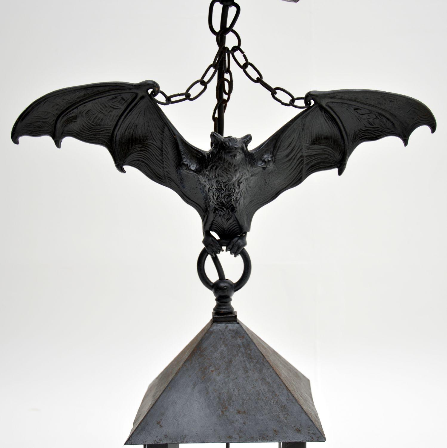 Very unusual antique French cast iron lantern with a very lifelike cast iron bat attached to the top. This lantern has glass panels and has just been re-wired. It’s in very good condition and I would date it to circa 1910 period, although it’s hard