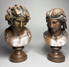 Antique French cast iron brass-plated busts of Antinous as Bacchus and Ariadne