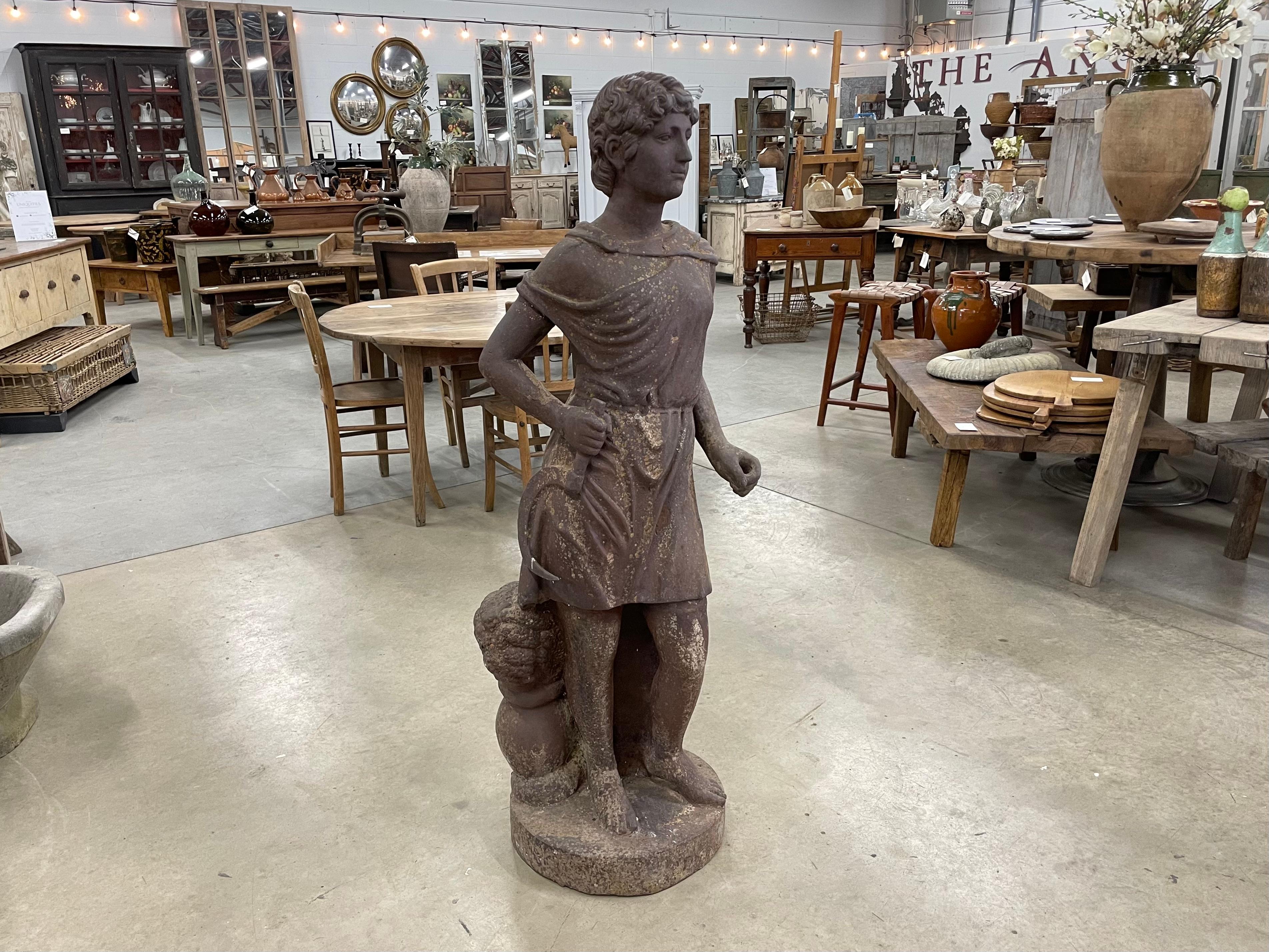 Beautiful and substantial antique cast iron statue of Demeter, the Olympian goddess of agriculture, grain and bread. She presided not only over crops and grains but also fertility of the earth and the path to a blessed afterlife.

Her demeanor is