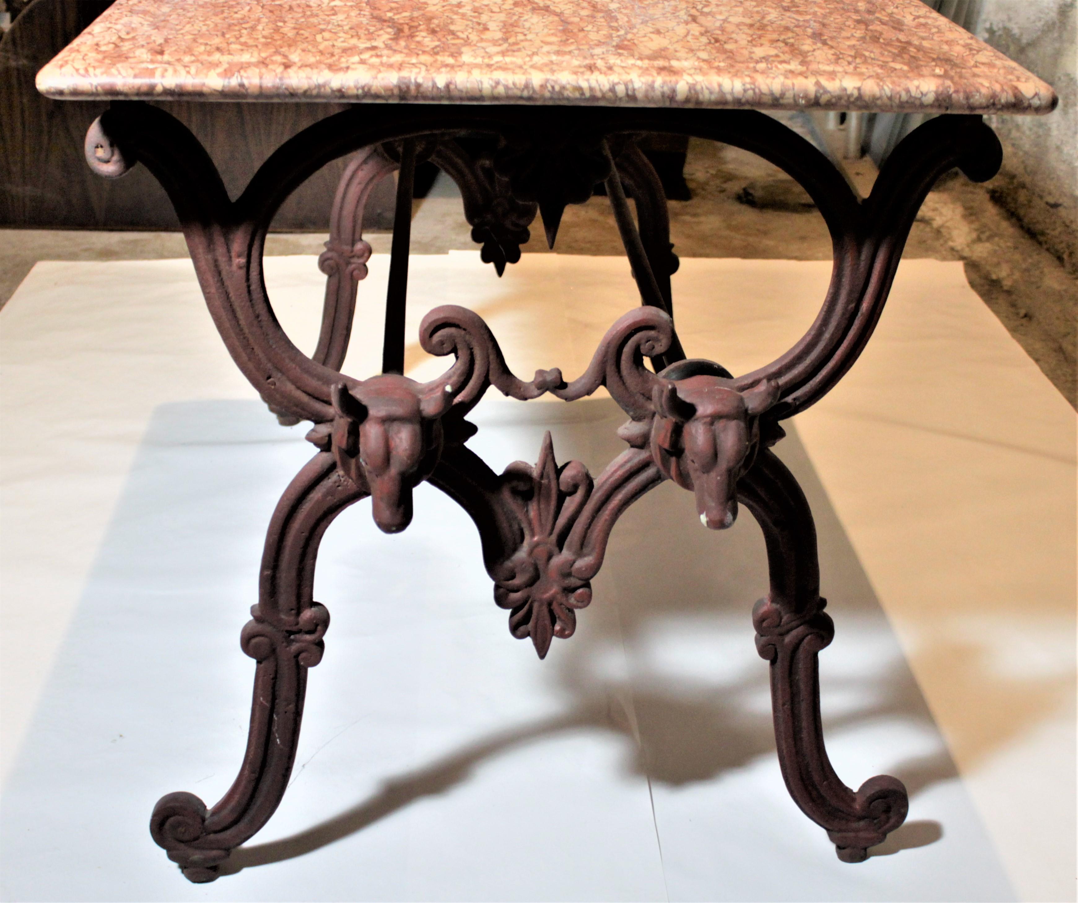 marble top table with cast iron base