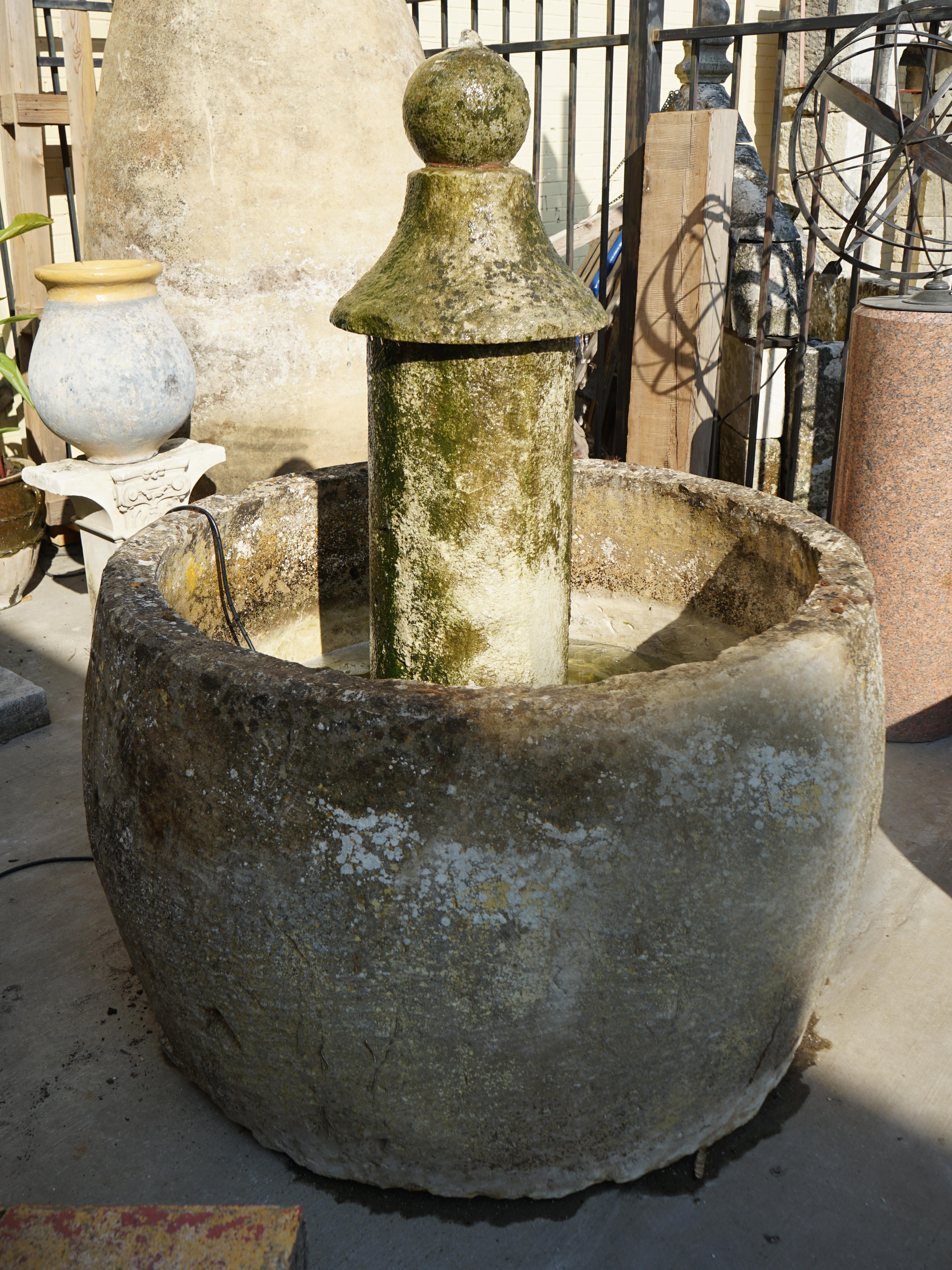 This antique French central bubbler fountain dates back to the 1880s.

Measurements: 64