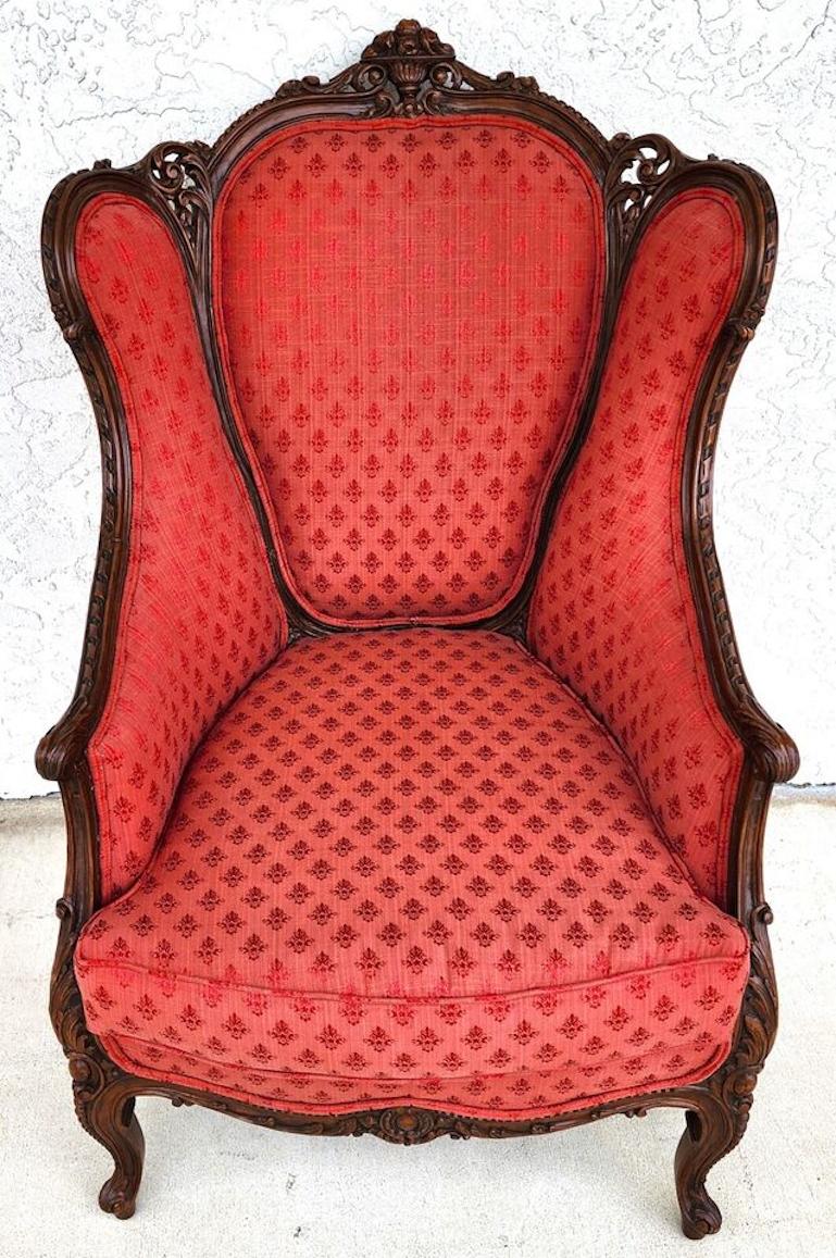 For FULL item description click on CONTINUE READING at the bottom of this page.

Offering One Of Our Recent Palm Beach Estate Fine Furniture Acquisitions Of An
Antique Early 1900s Carved Walnut French Louis XV Style Bergere Chair

Approximate