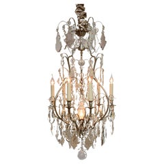 Antique French chandelier with clear and soft coloured crystals