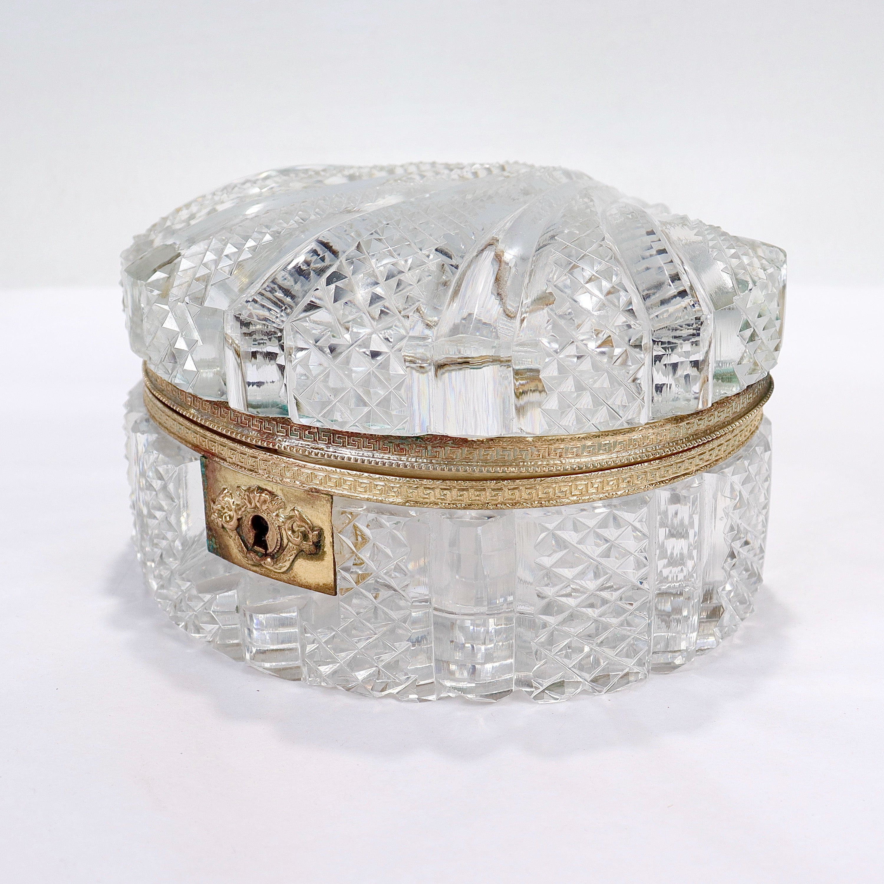 A fine antique French cut glass casket.

In the Charles X style.

In the form of a seashell with a bronze mounted lid.

Simply a great French cut glass casket!

Date:
Late 19th or Early 20th Century

Overall Condition:
It is in overall