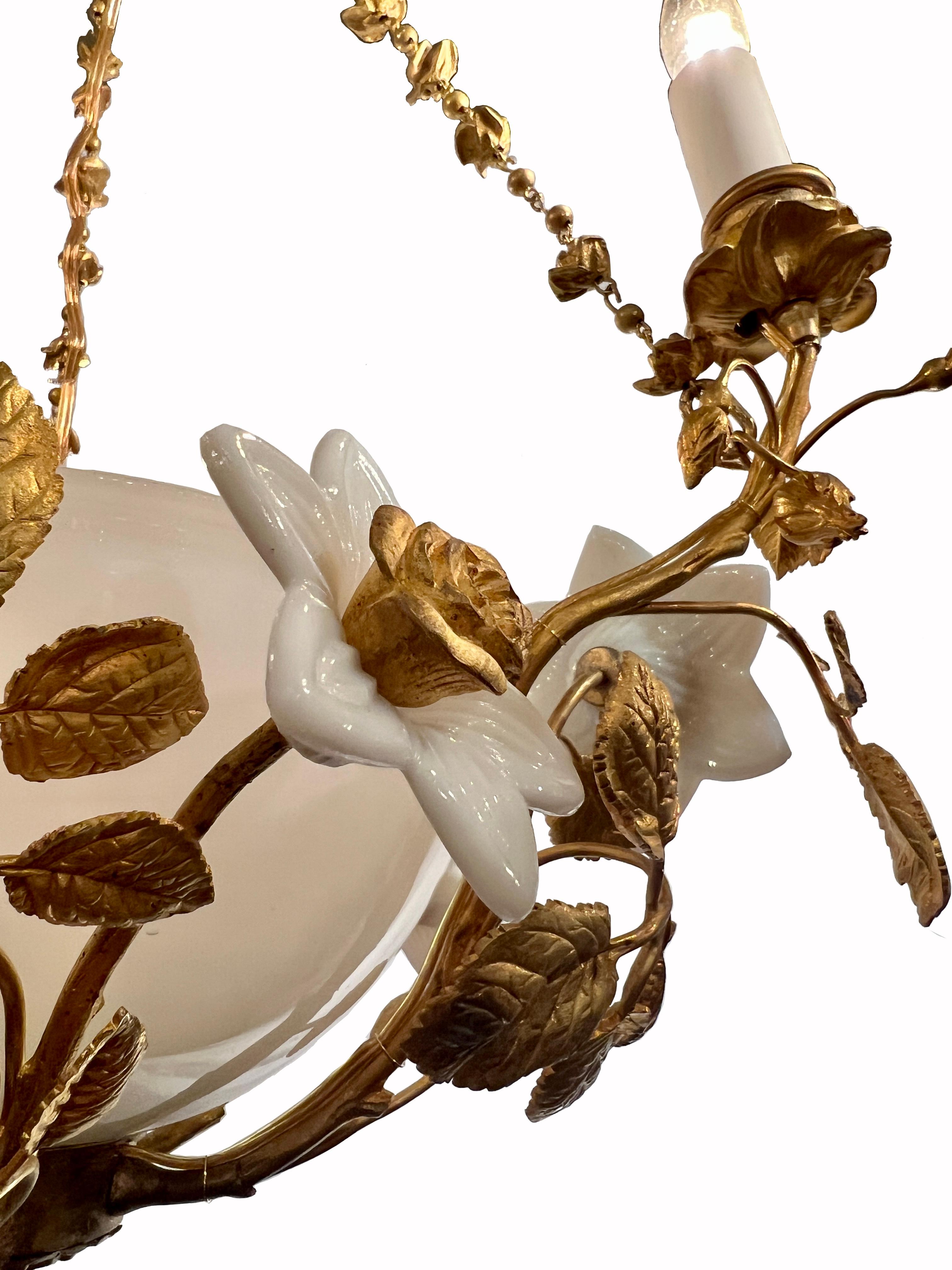 Antique French Charming Milk Glass 3 Light Chandelier with Gold Bronze Flowers, Circa 1900s.