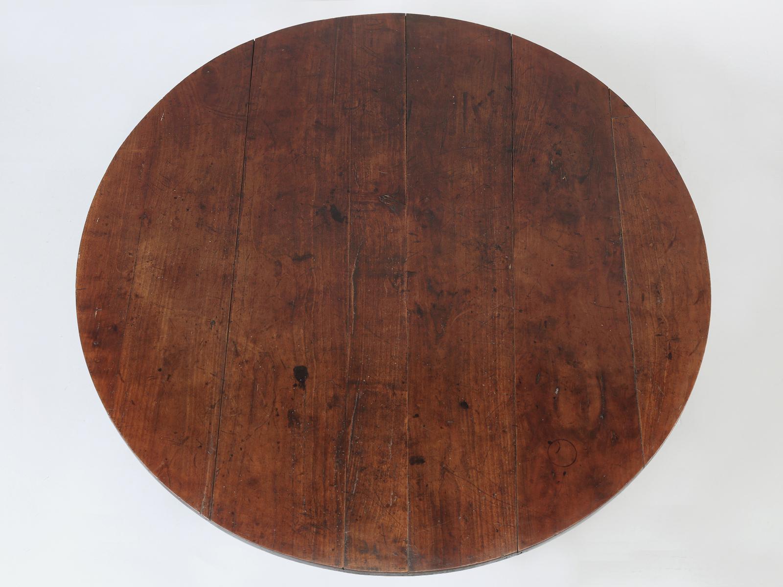 Someone in France apparently had the bright idea to convert an antique cherrywood wine tasting table, into an antique looking coffee table. The patina of the cherry wood is spectacular to say the least, for those of you who love old cherry and how
