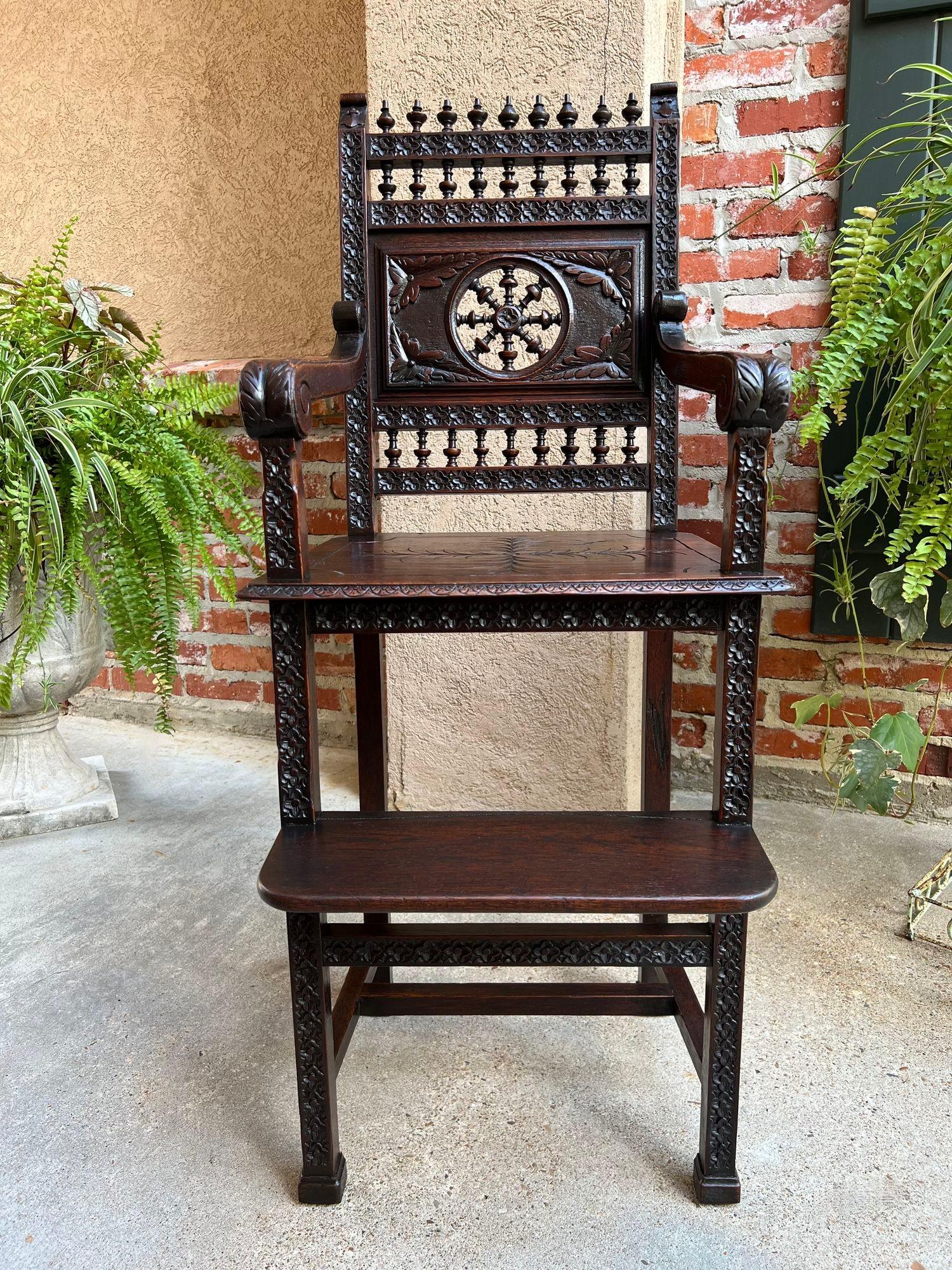 Antique French Child Doll High Chair Brittany Breton Ship Spindle Carved Dark Oak.

Direct from France, and quite a rare find, this lovely hand carved 19th century high chair!
NOTE: The style and design are true to the Celtic roots of the Brittany