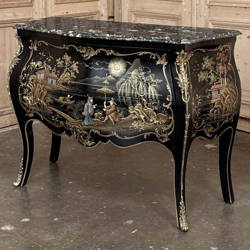 Antique French Chinoiserie Black Lacquer Bombe Commode showcases the French adaptation of what was then termed the Style Oriental in a brilliant effort to duplicate the majesty of the exotic Far East which was the rage.  The hand-painted scenery on
