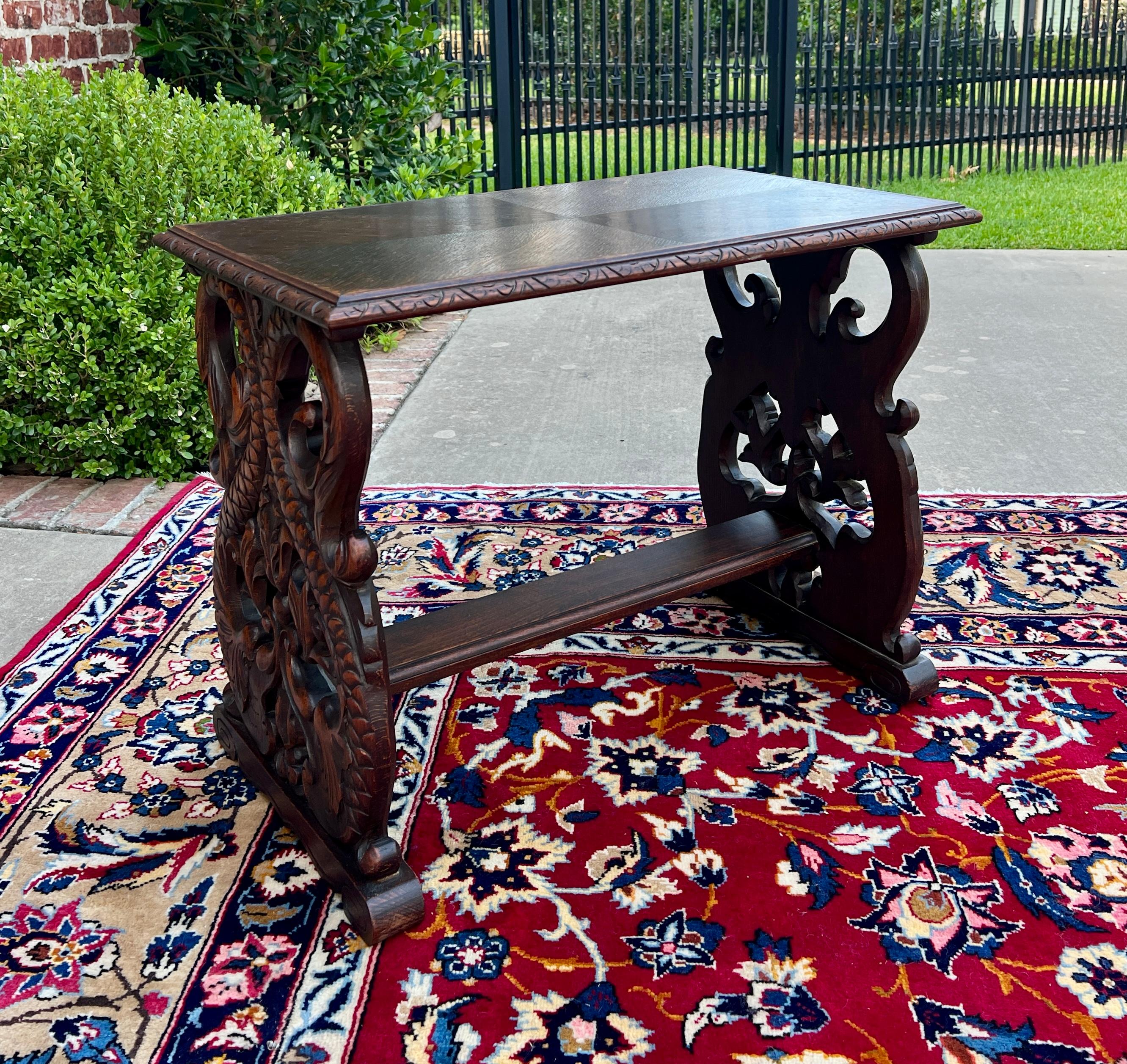 Antique Carved Oak French Renaissance Revival Coffee Table, End Table, or Side Table~~c. 1920s

 Nicely carved dolphins on sides

Versatile piece with so many functions~~use as a traditional coffee table, entry or hall bench or under a stairwell in