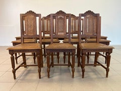 Antique French Colonial Rattan Dining Chairs – Set of 12