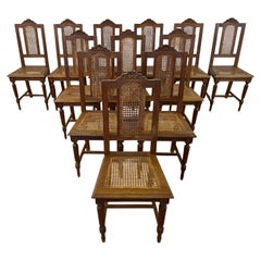 Antique French Colonial Rattan Dining Chairs – Set of 12